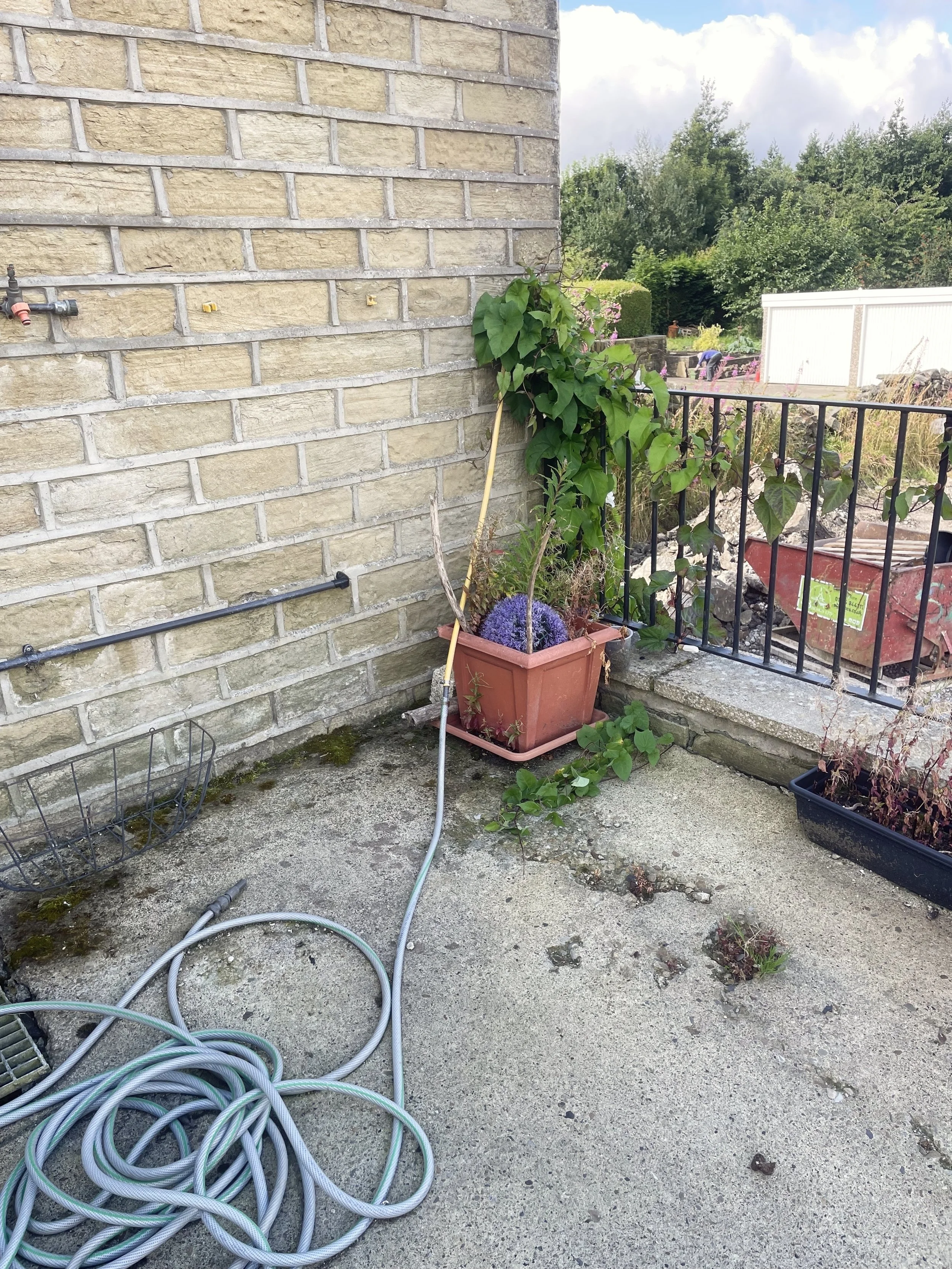 Ugly concrete strapping on the property. This strapping is detrimental to the property as the mositure cant escape