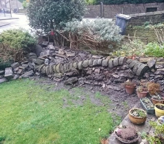 Poorly looking dry stone wall required a rebuild