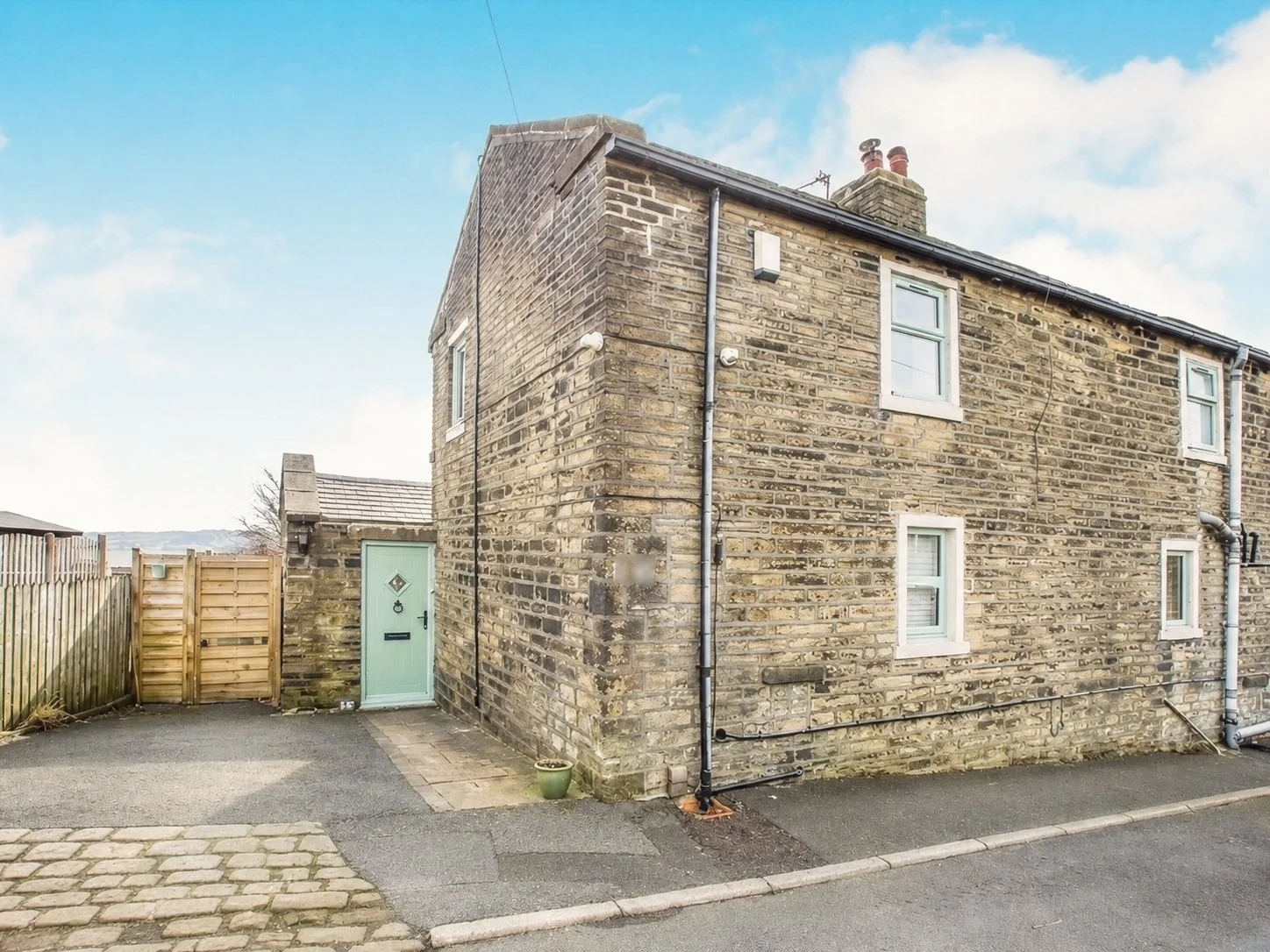 Ground level view of the property prior to repointing