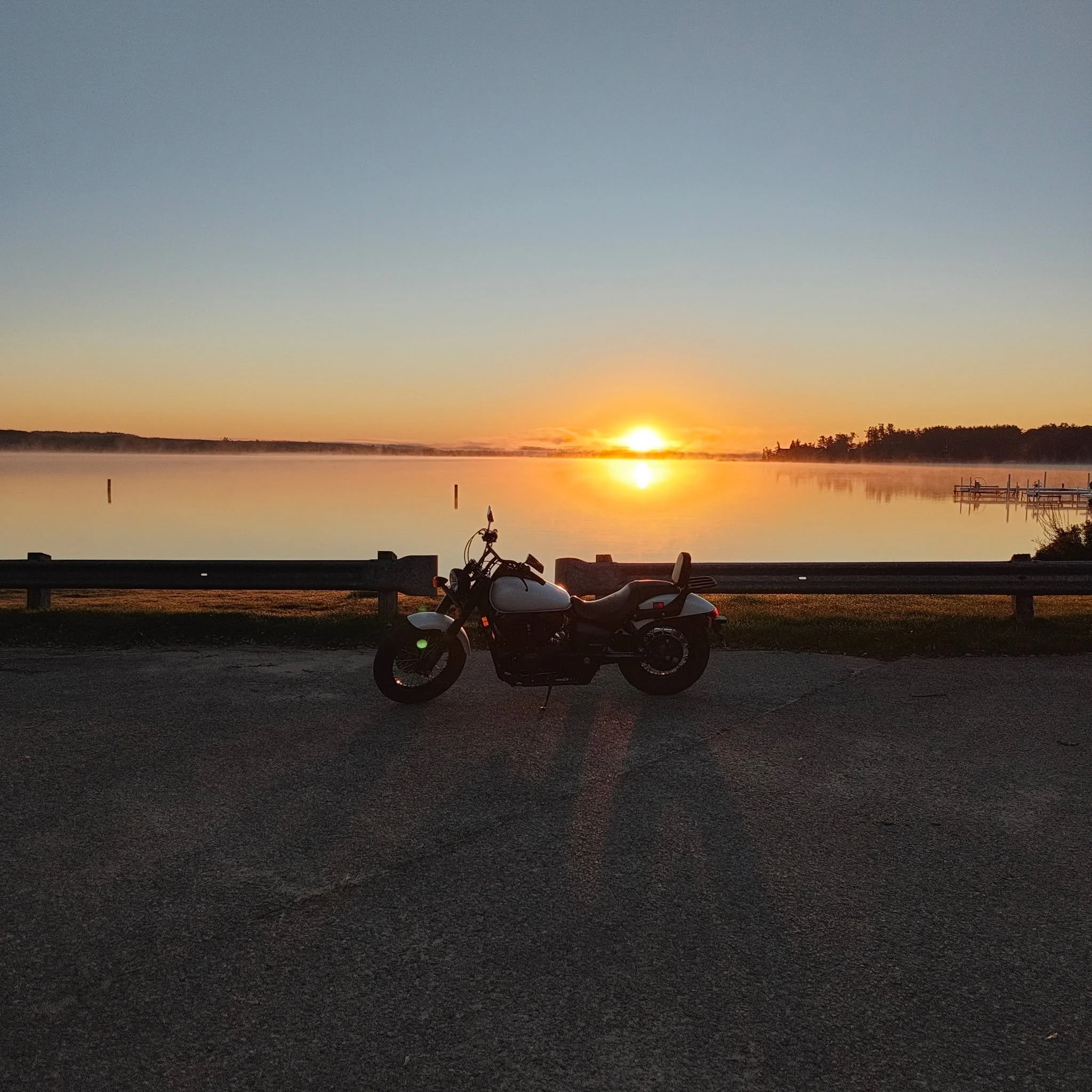Sometimes you have to stop and watch the sunrise. Mornings are my favorite time to ride. It's calm and cool, the traffic is minimal, and the lighting is always beautiful. It's the most peaceful time to just go.
 #petoskey #ridesafe #crookedlake #sunr
