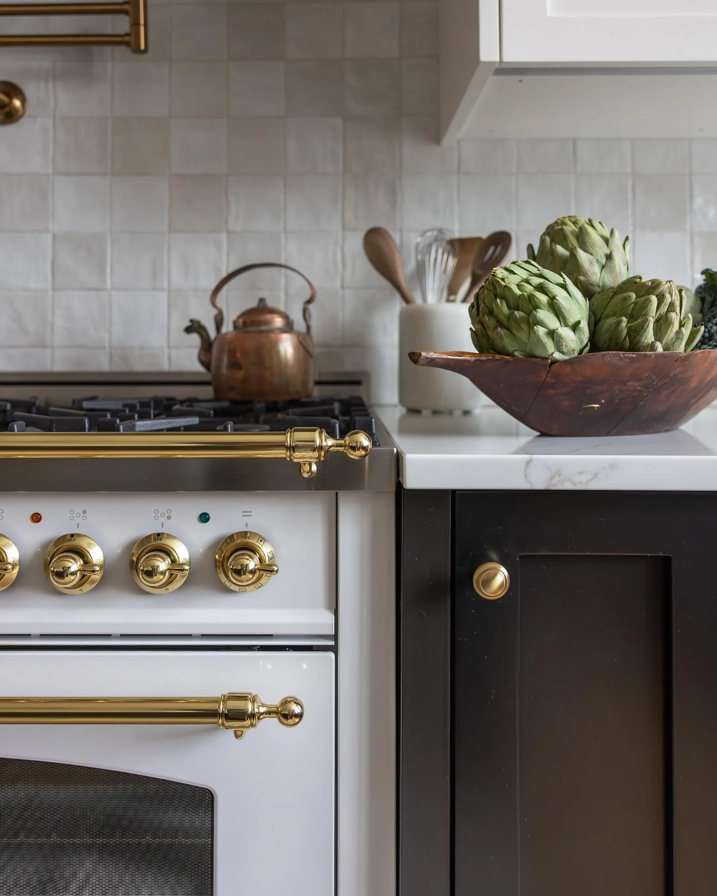 One of my favorite shots to grab when I am shooting in a kitchen is a tight vignette of the stove/counter. This one was particularly sumptuous with layers of materials and textures. @campbellministerdesign