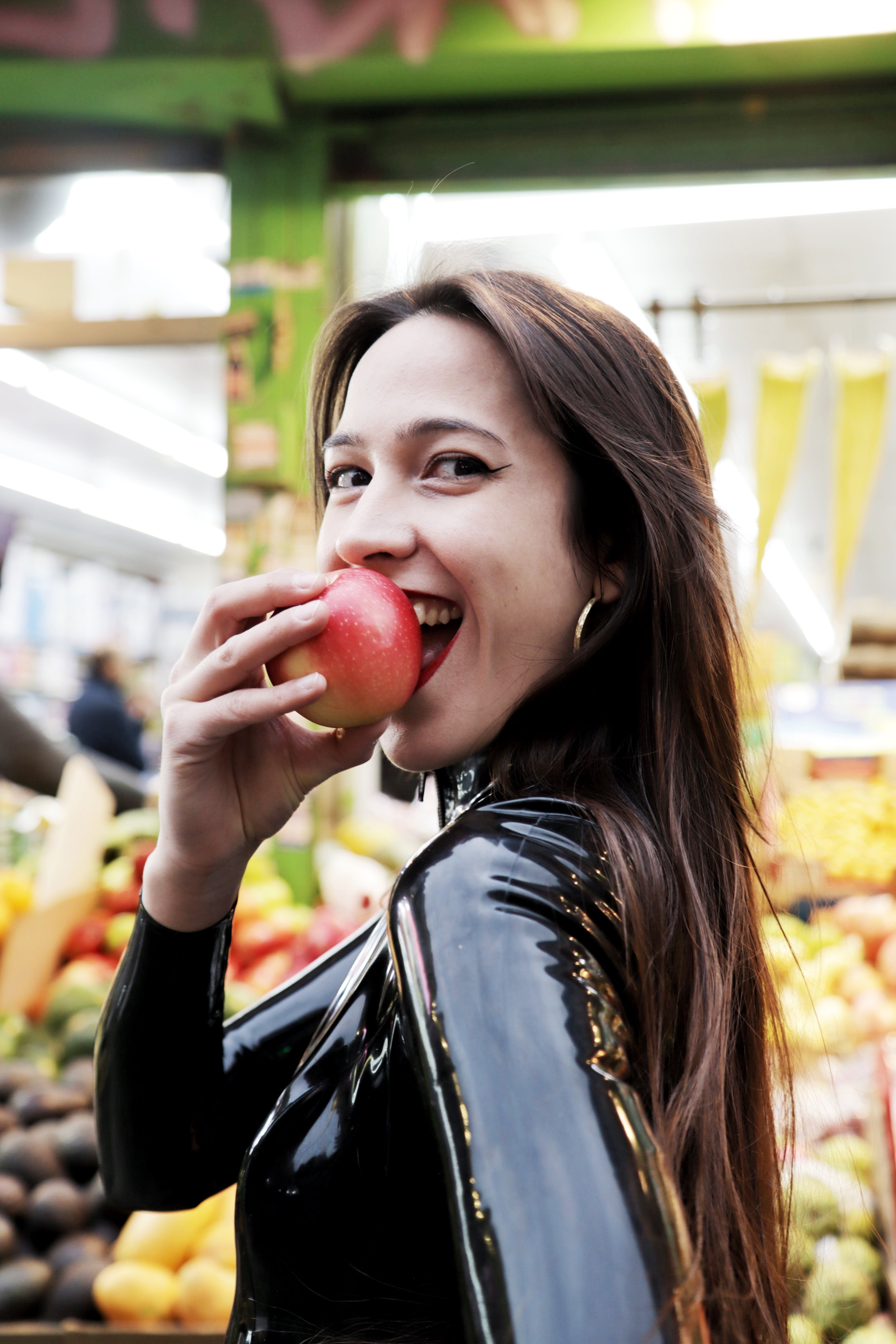 Mistress Fun eating apple
