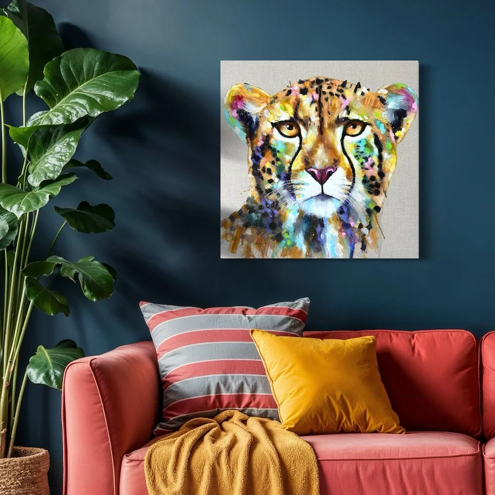 kasi the cheetah by Louise Luton in darker room setting.jpeg