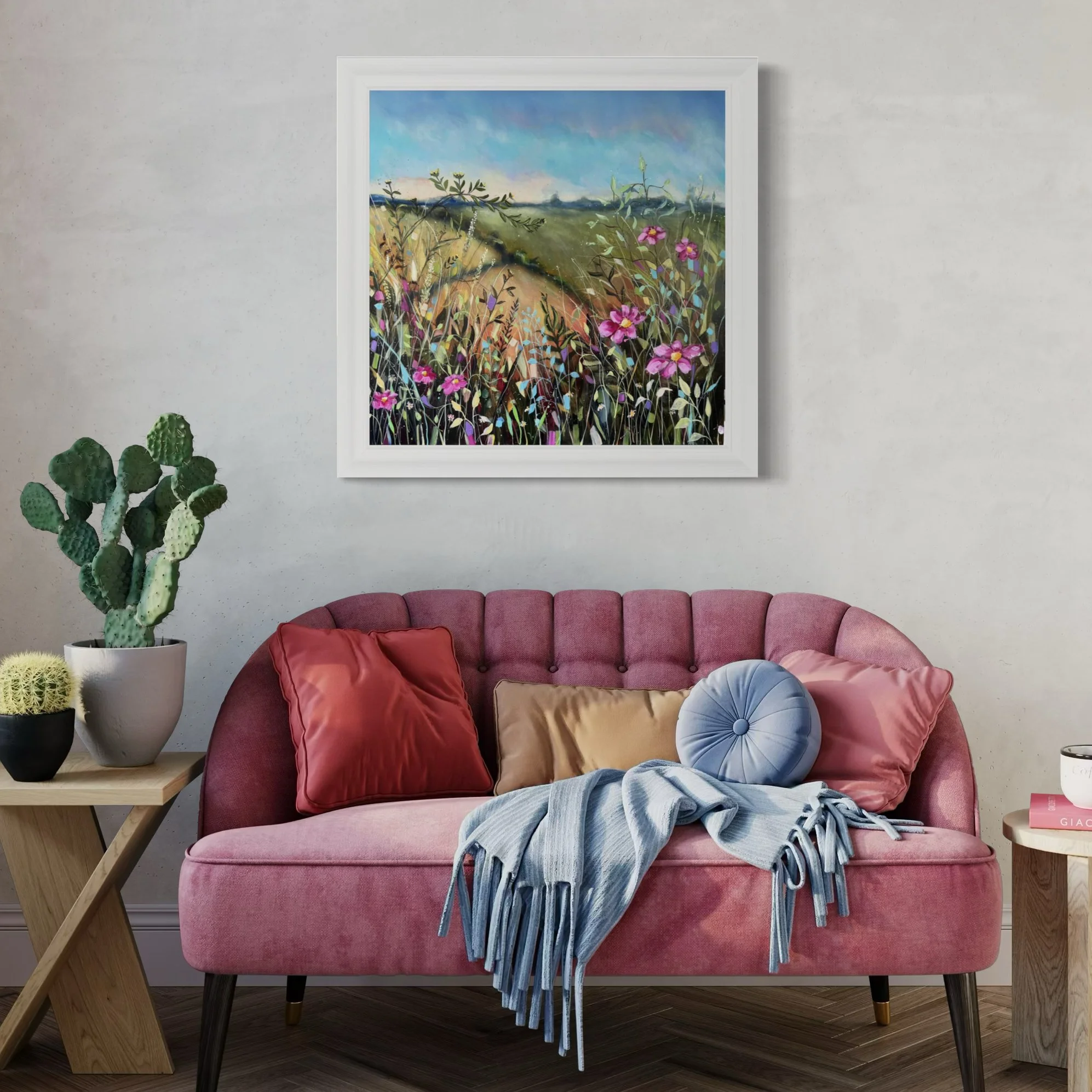 Fields print by Louise Luton with pink sofa.jpeg