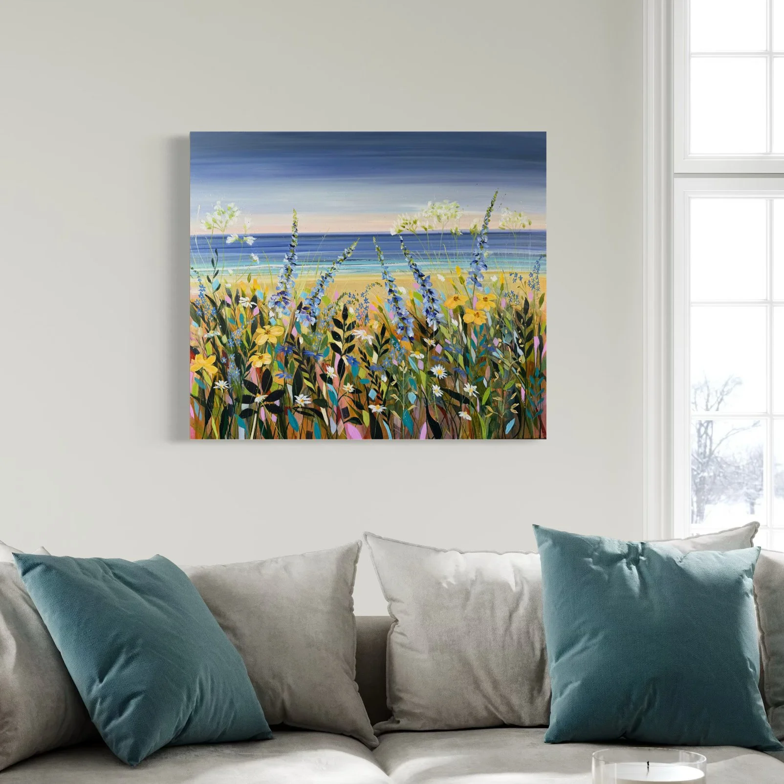 moments like this seascape in room with turquoise cushions.jpeg