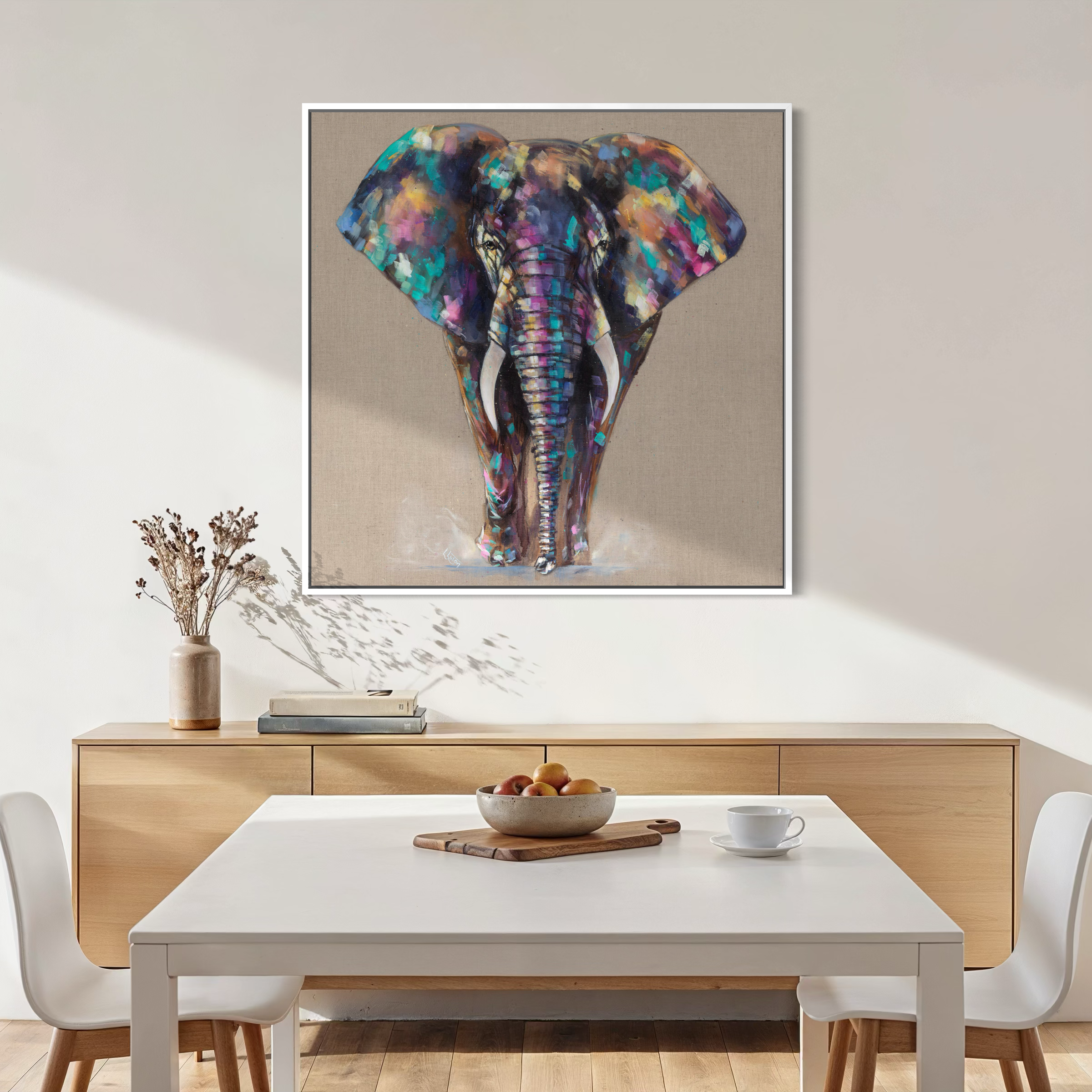 Hugo the colourful elephant by Louise Luton .png