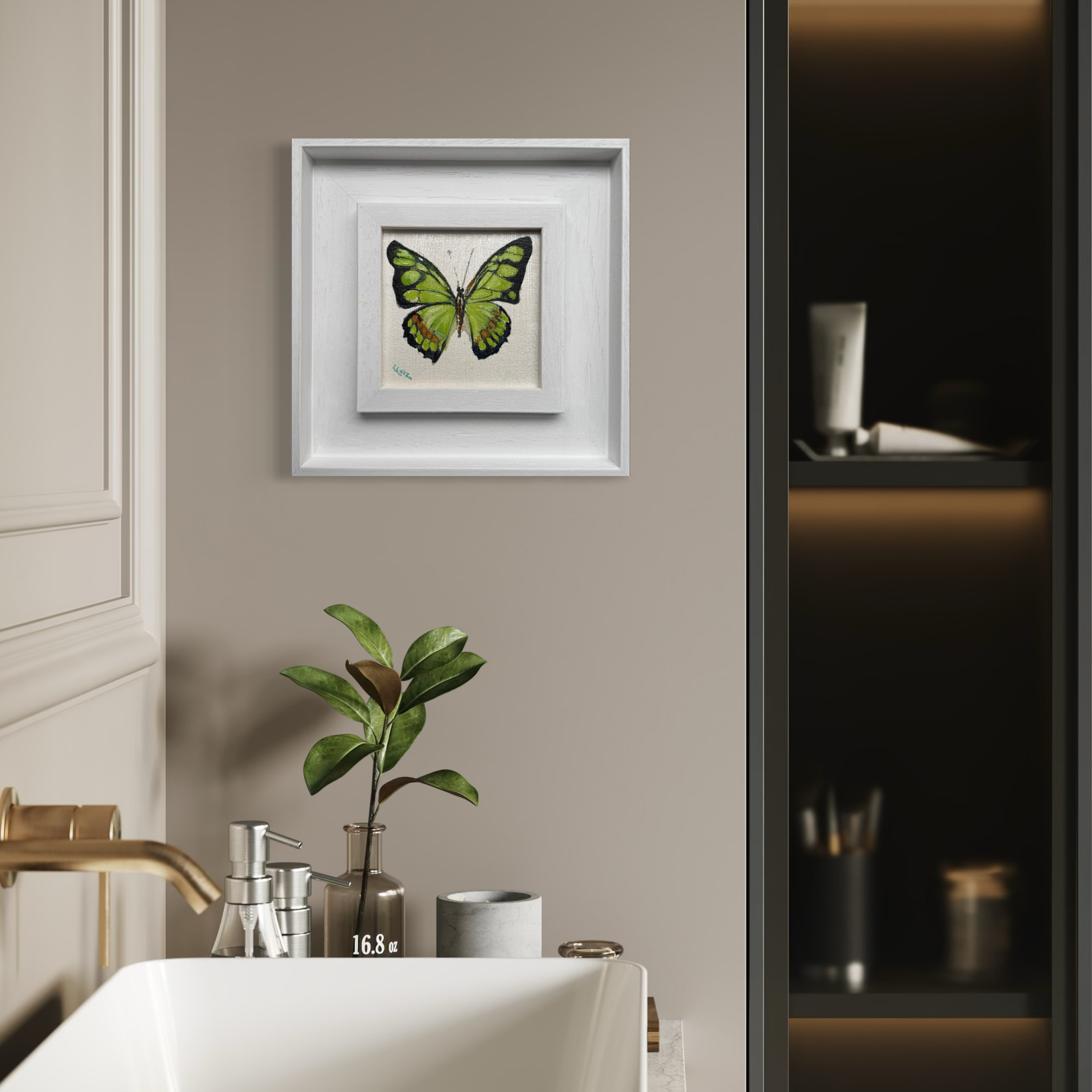 green buterfly in frame in bathroom setting Louise Luton.png