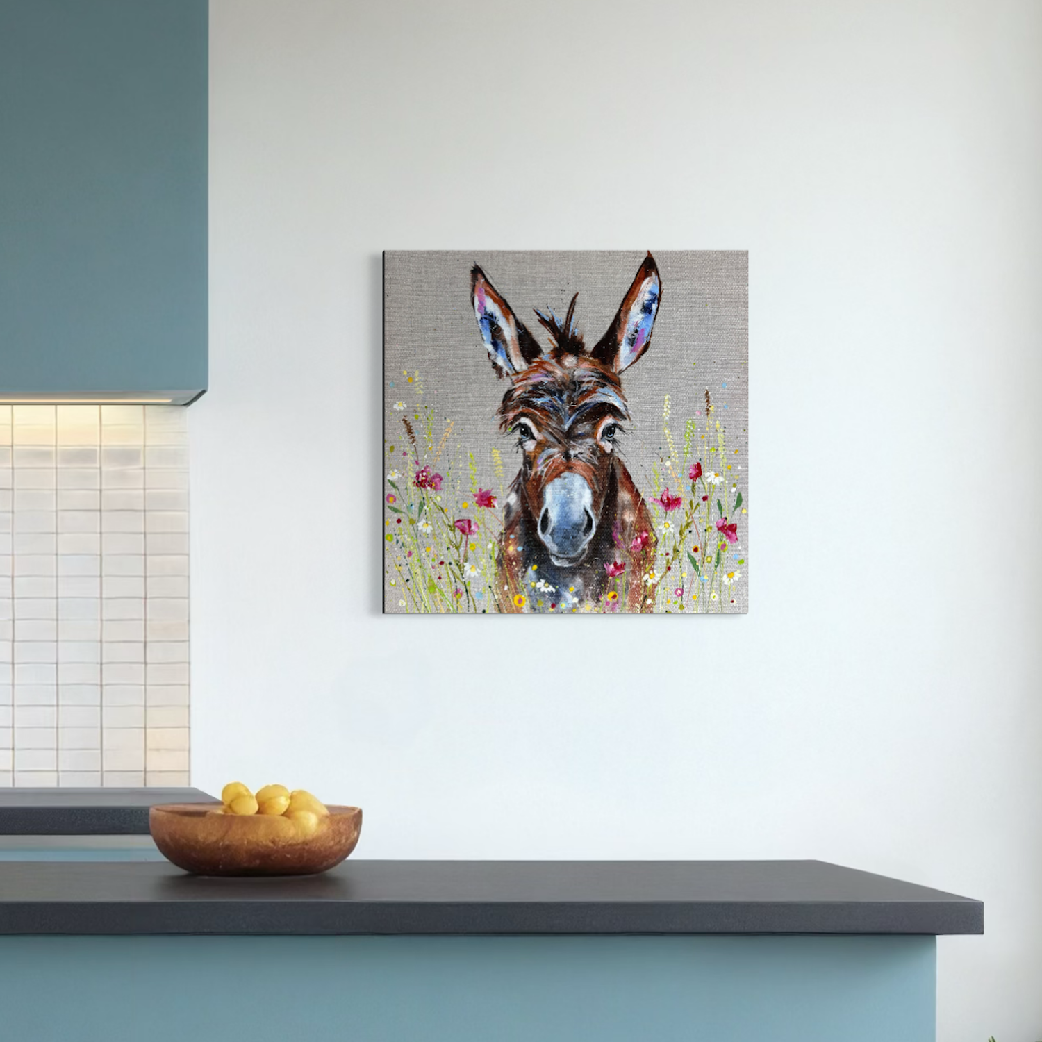 poppy the donkey by Louise Luton in kitchen setting.png