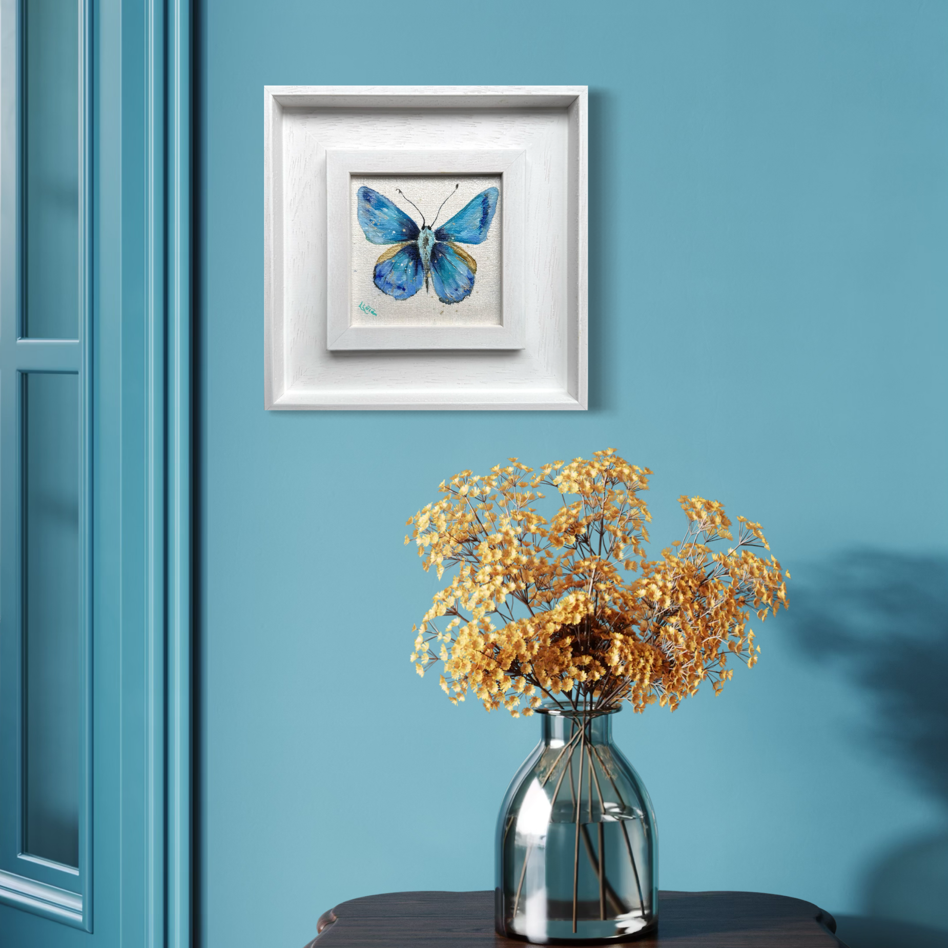Blue butterfly by Louise luton in blue room.png