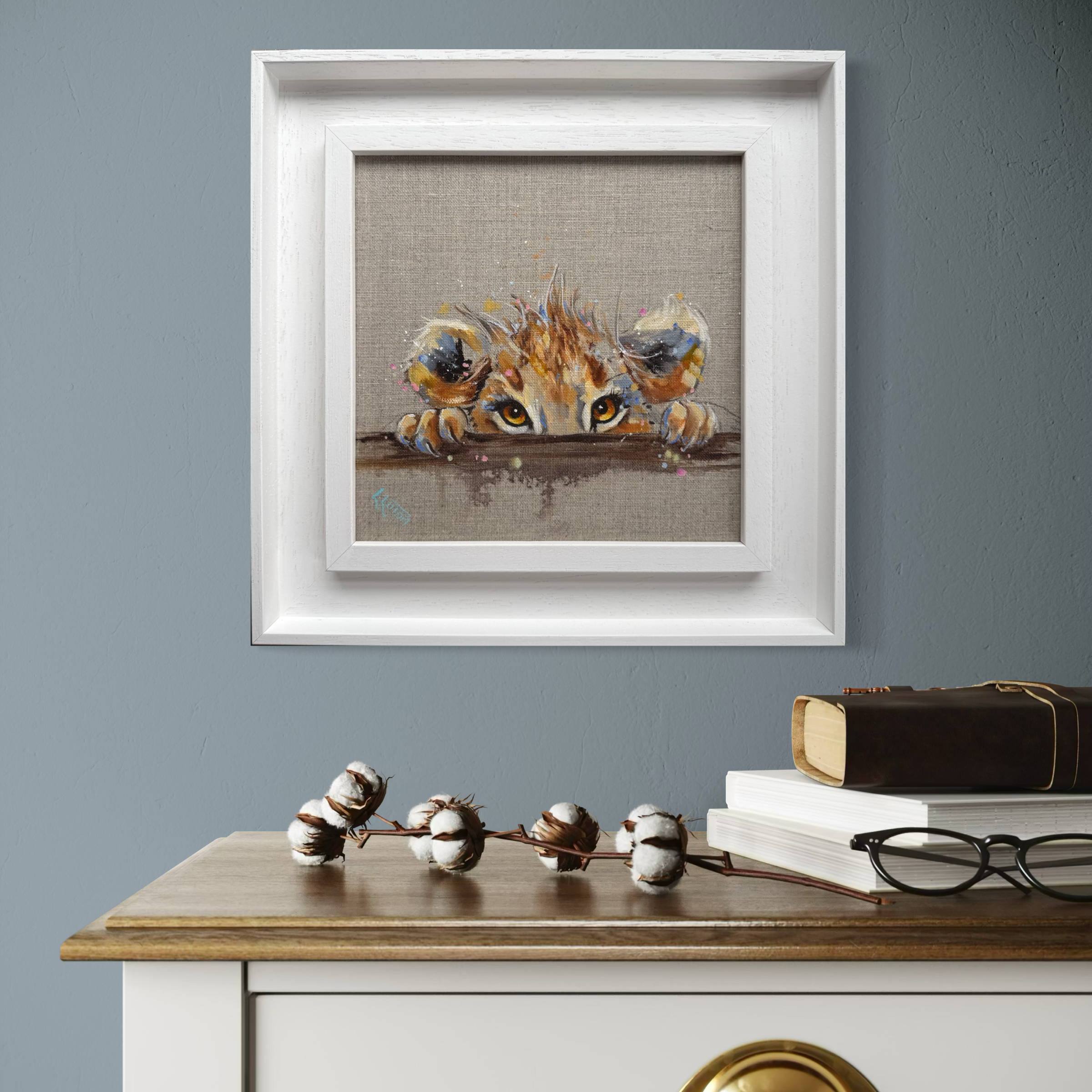 Lion cub painting by Louise Luton in room setting.png