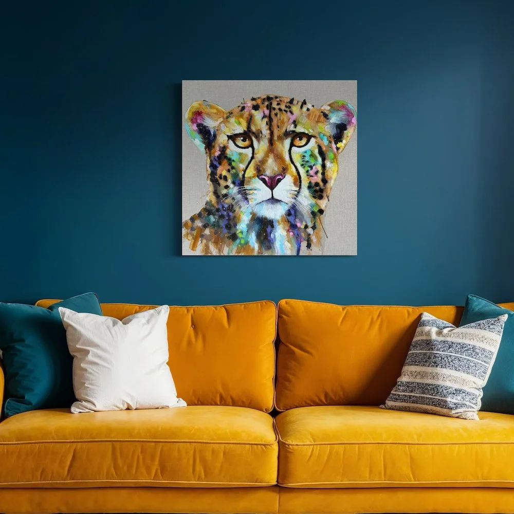 Kasi the cheetah by Louise Luton above yellow sofa.jpeg