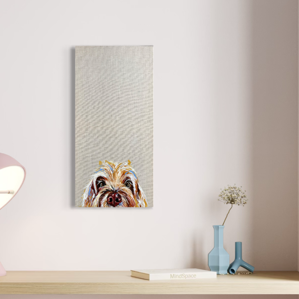 quircky doodle dog painting by Louise luton in desk setting.png