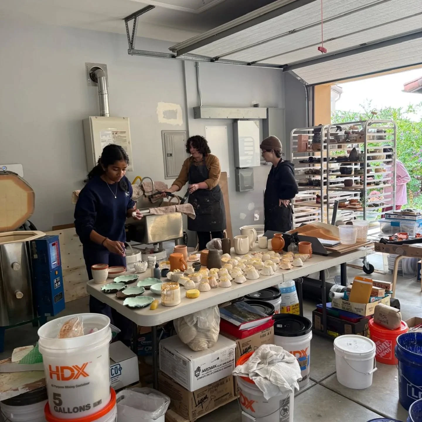 Look at how far we've come! 

For months we had been working out of Meha's garage! Hosting impromptu open studio hours, firing pieces in a mini kiln, and using prime parking spots as a glazing area. Have you been with us from the beginning? Come cele