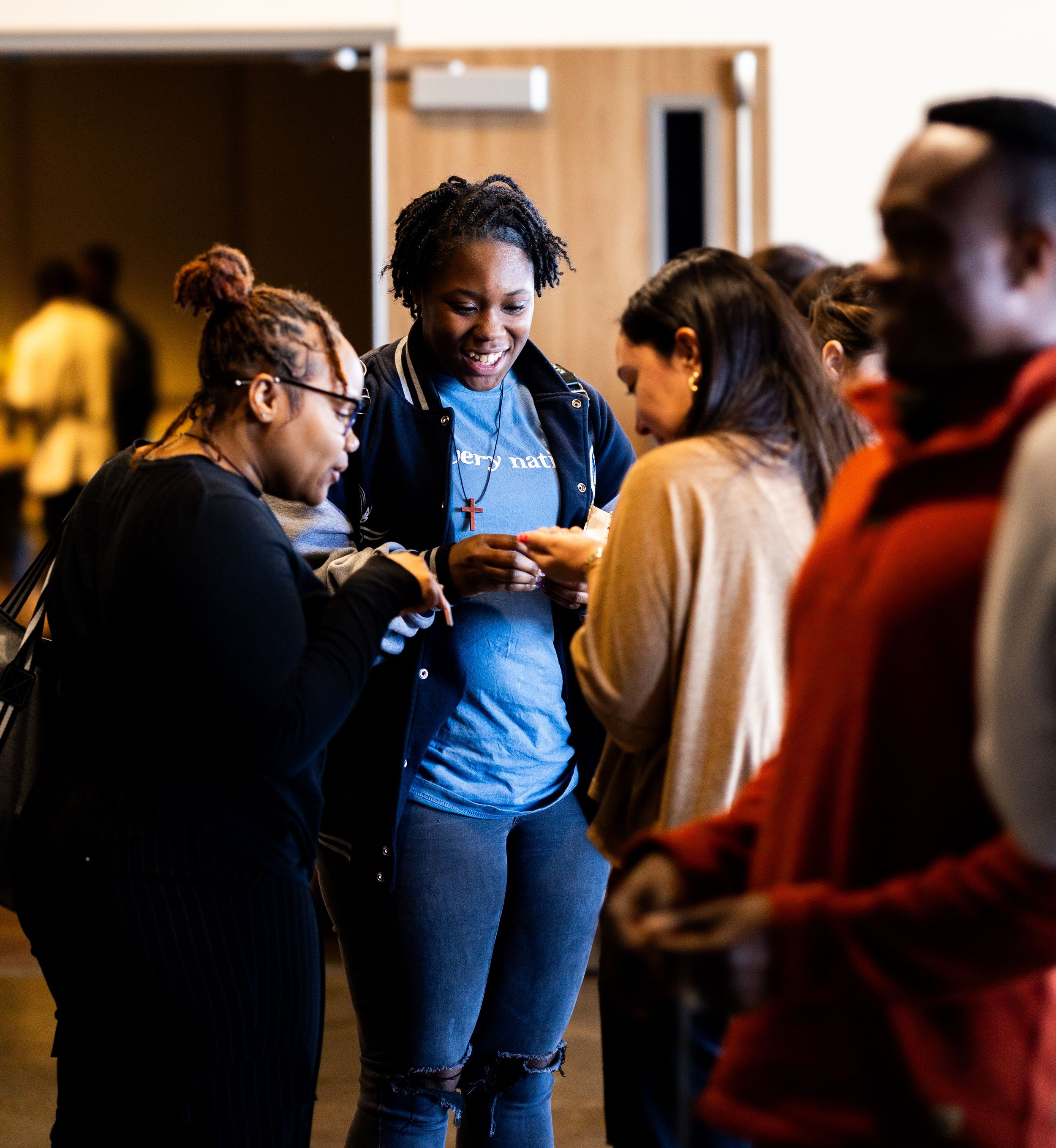 Community members connecting during an outreach event.