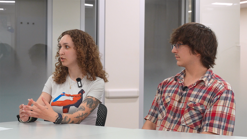 Two young adults participating in a discussion about fentanyl and overdose prevention.