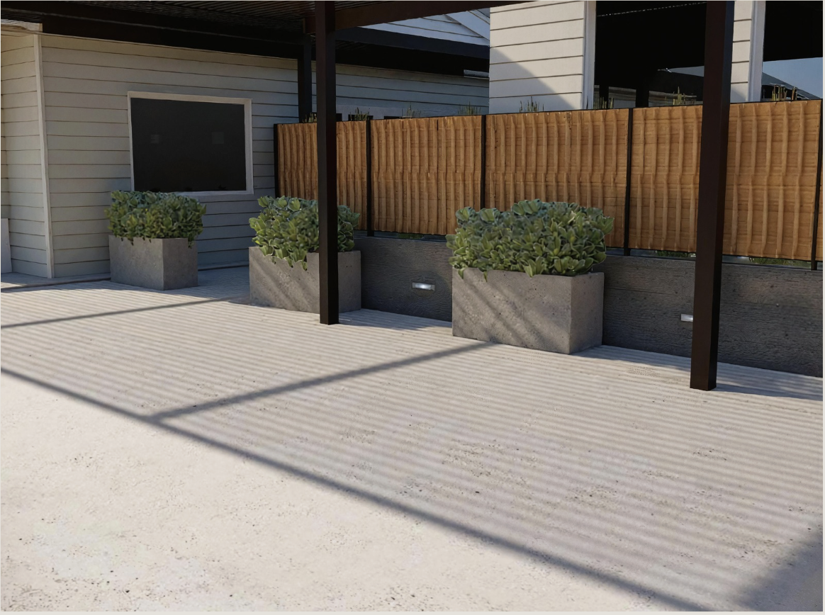 Outdoor patio area with concrete flooring, potted plants, a wooden privacy fence, and house siding in the background.