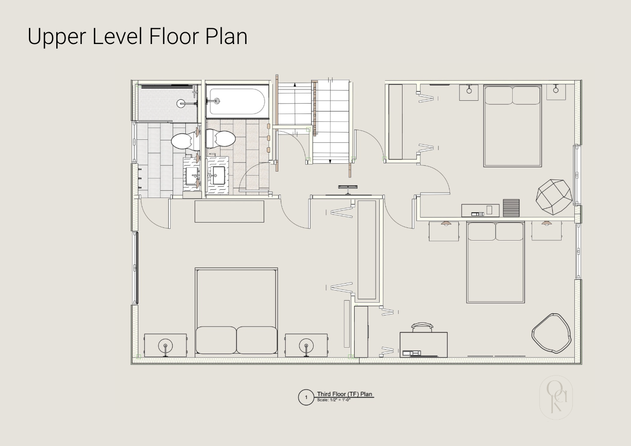 Floor plan of the upper level of a house including bedrooms, bathrooms, and staircases.