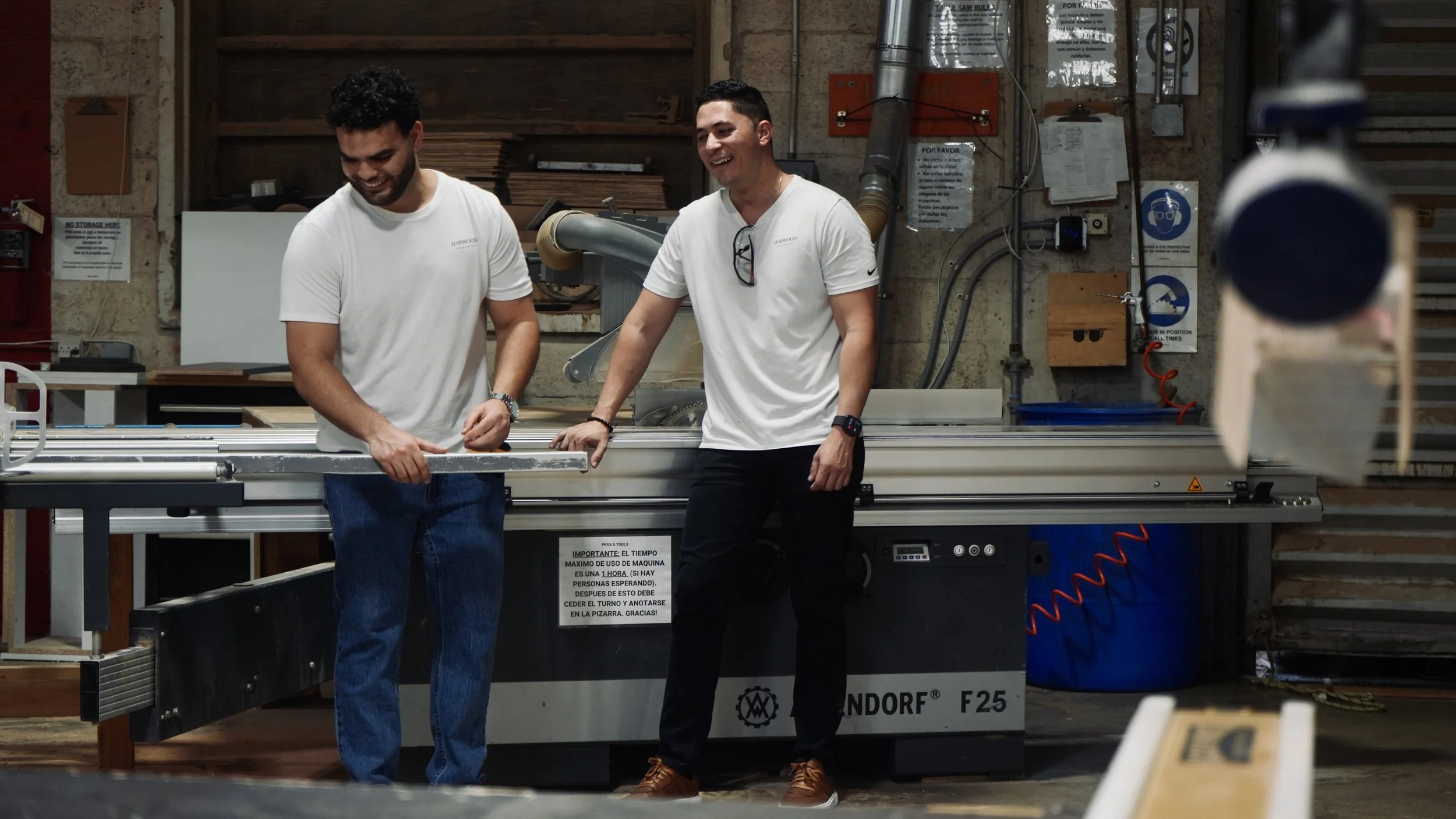 Anthony and Handry working together in the shop