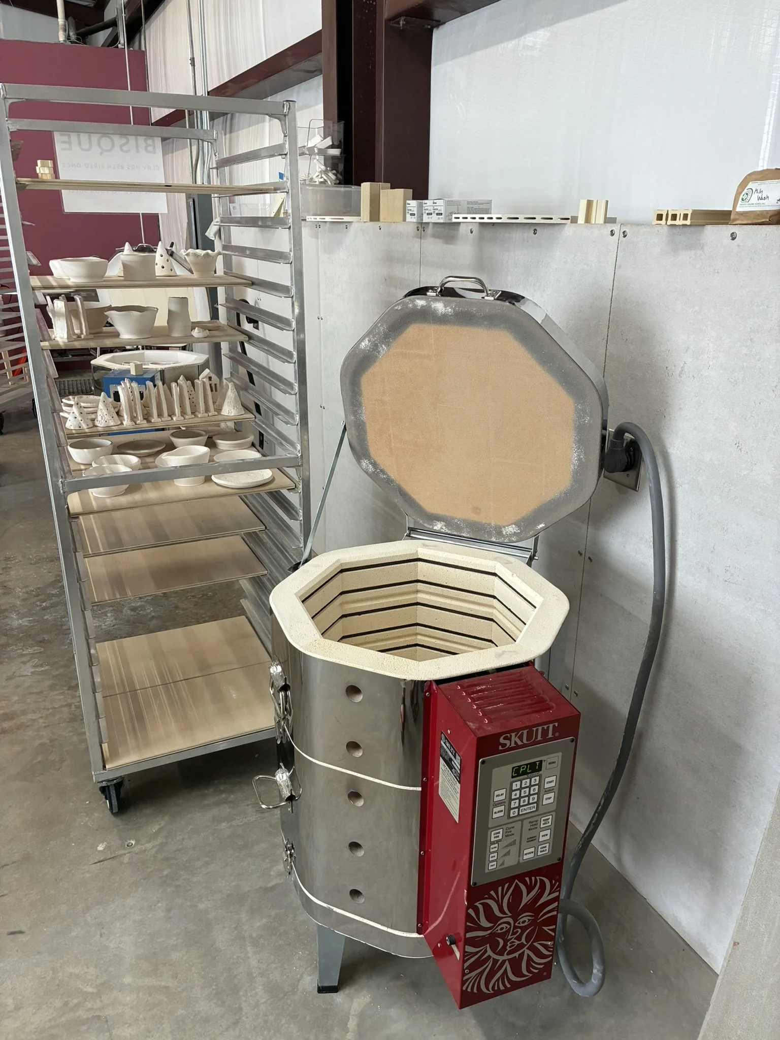 A commercial kiln in a ceramic studio.