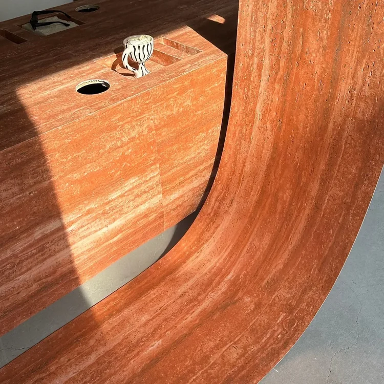 Furniture clad in travertine texture