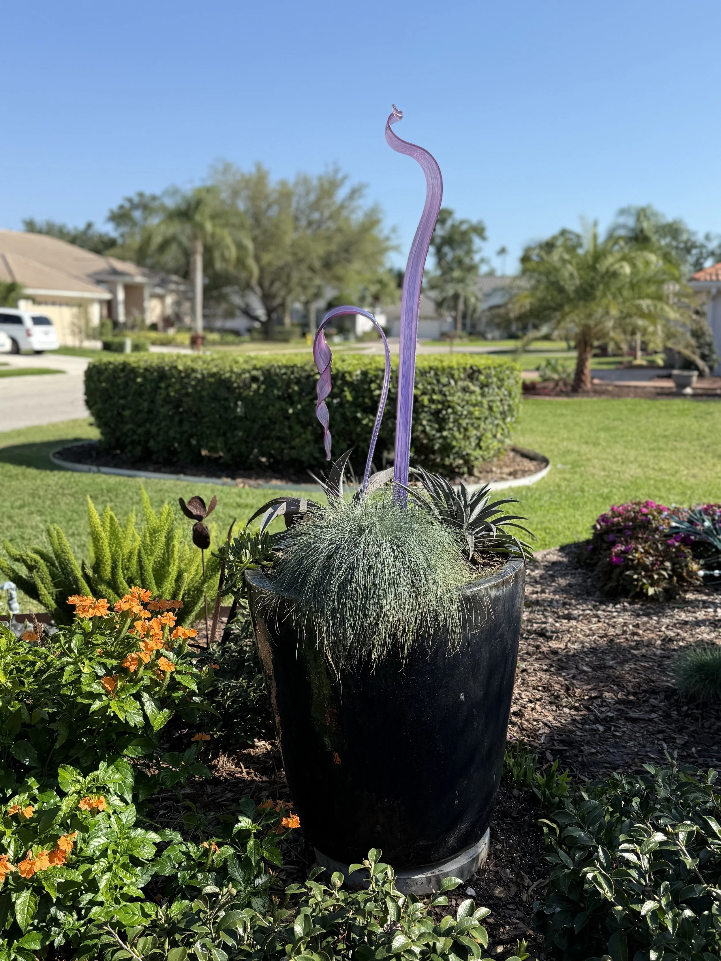 you gotta have art is a garden and not just any art. statement pieces that are beautiful and not over done.  