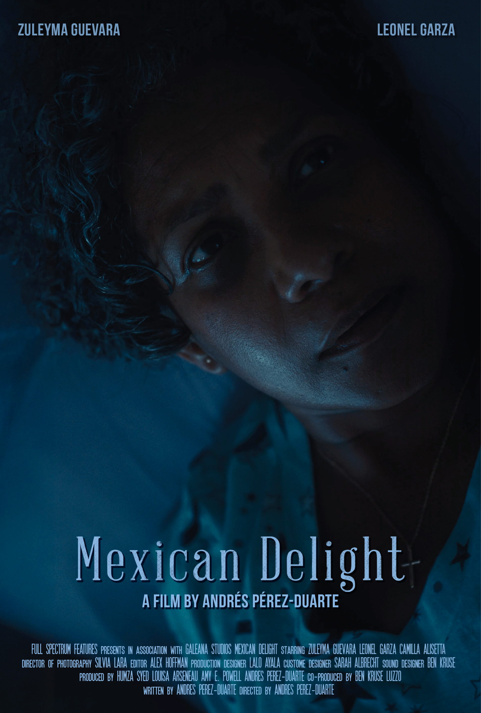 Close-up of a woman with curly hair lying in a dimly lit environment, looking upward with a serious expression, promotional poster for the film 'Mexican Delight'.