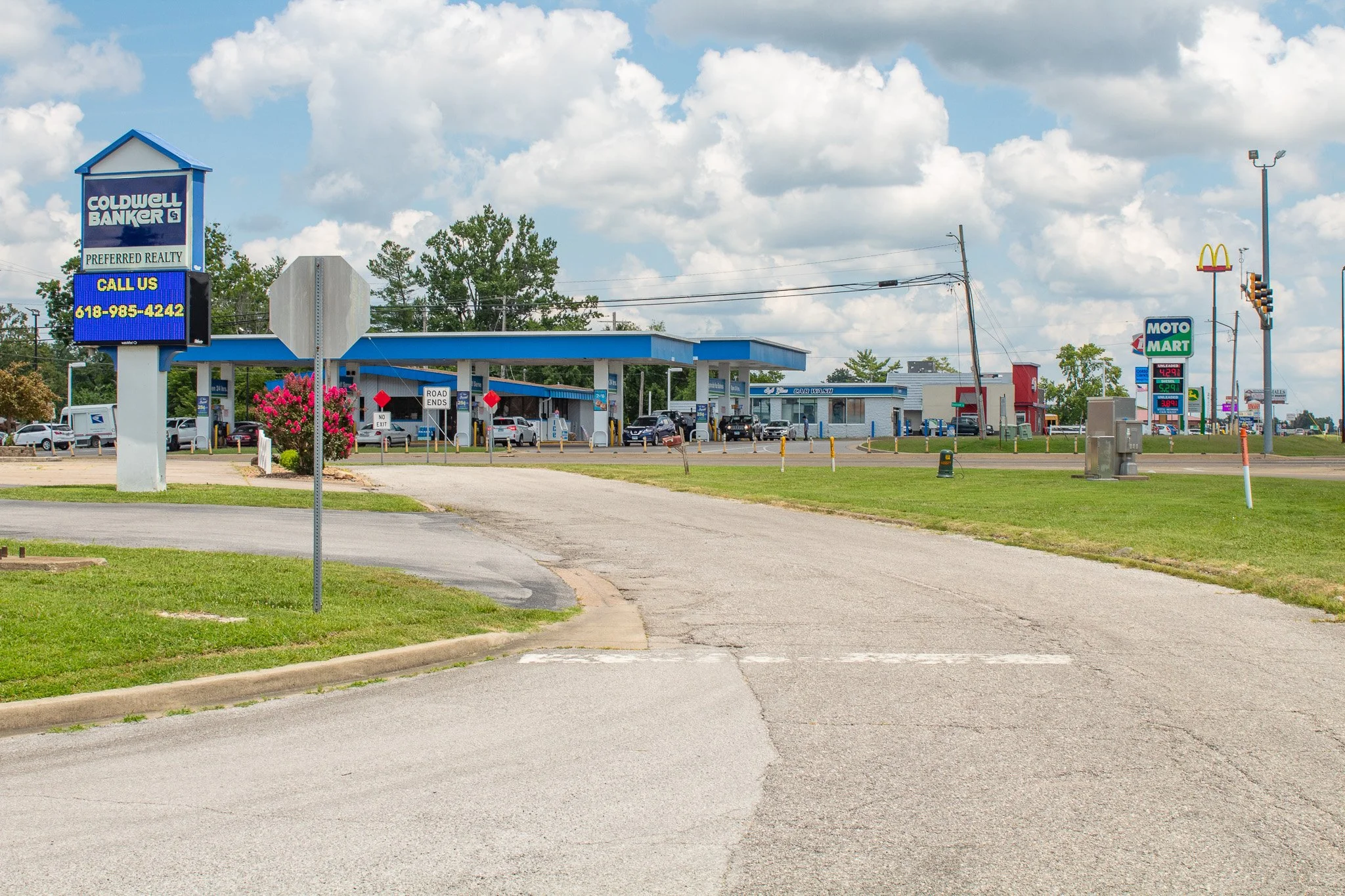 A roadway connecting to a gas station