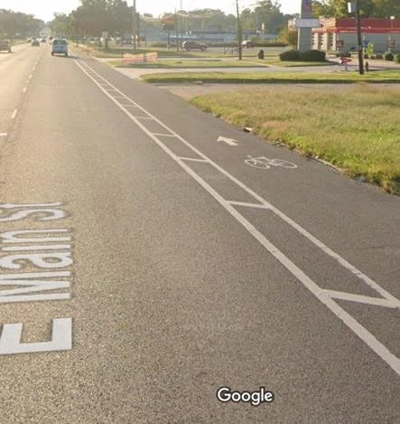 A bike lane marked on the side of the road