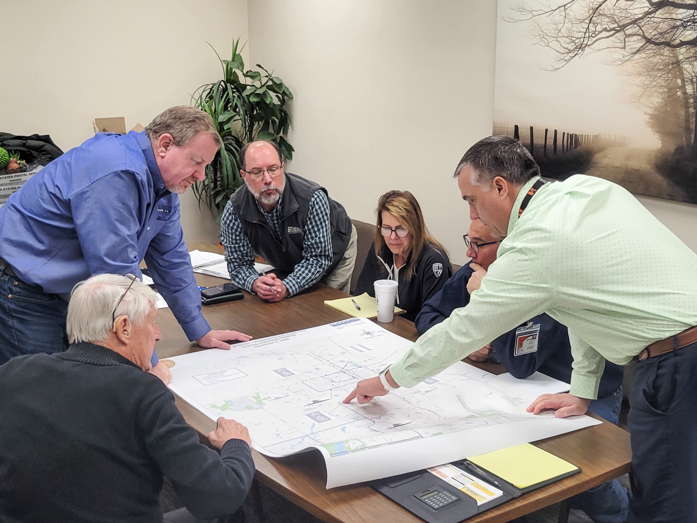 The project team reviewing bike path plans in Herrin