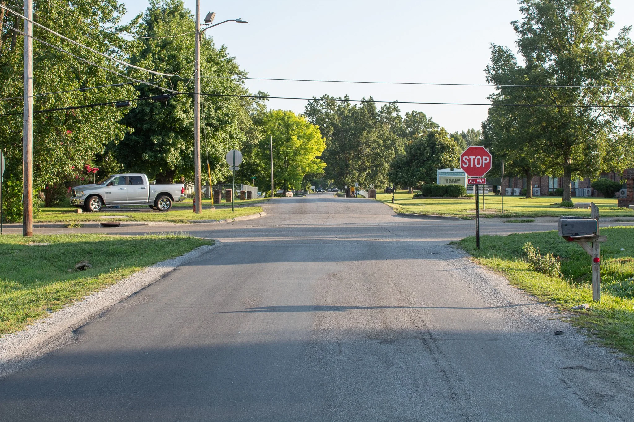 A roadway with a stop sign