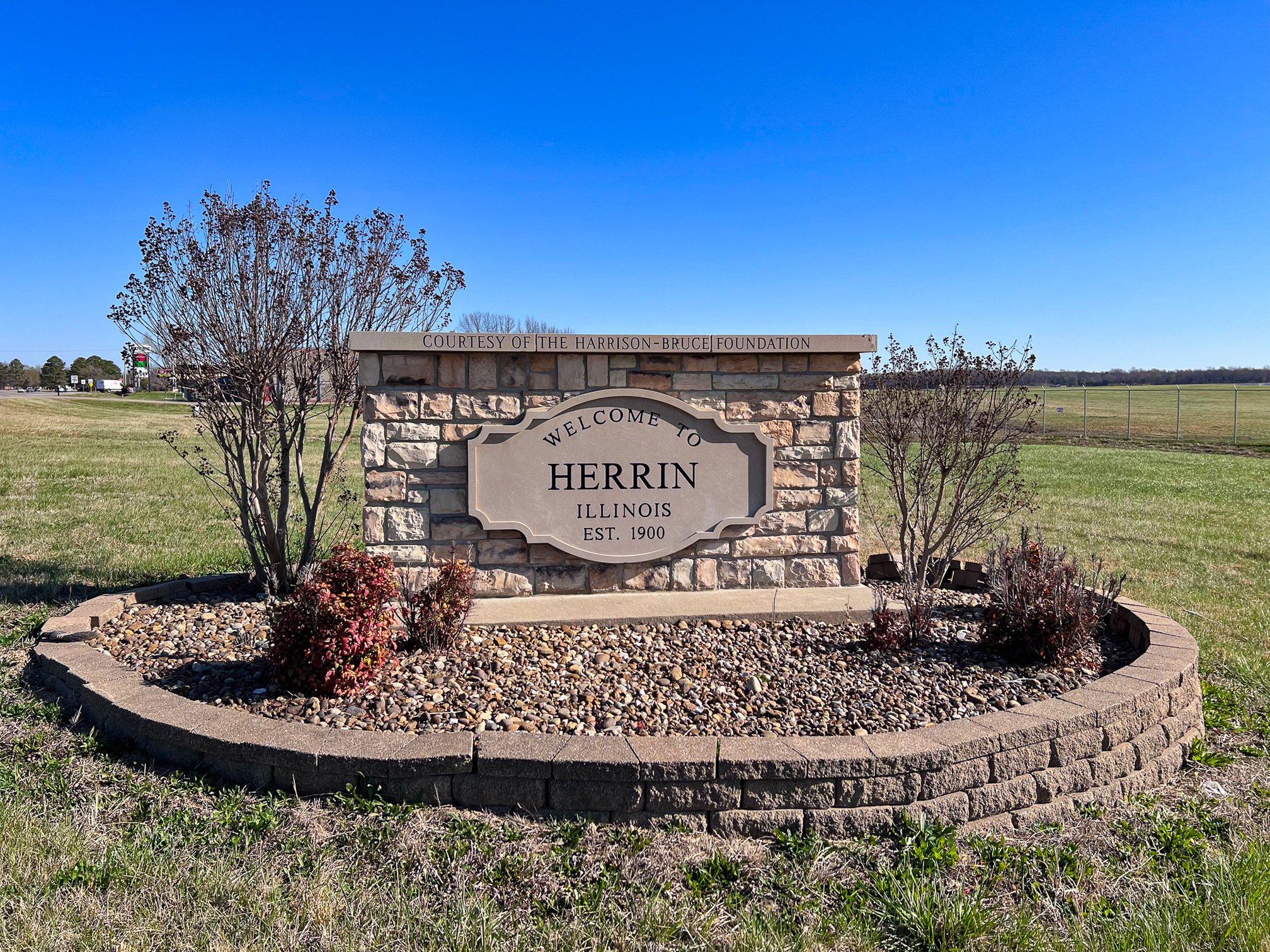 A sign that welcomes visitors to Herrin