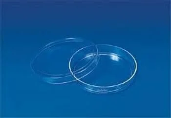 Three transparent contact lenses on a blue background.