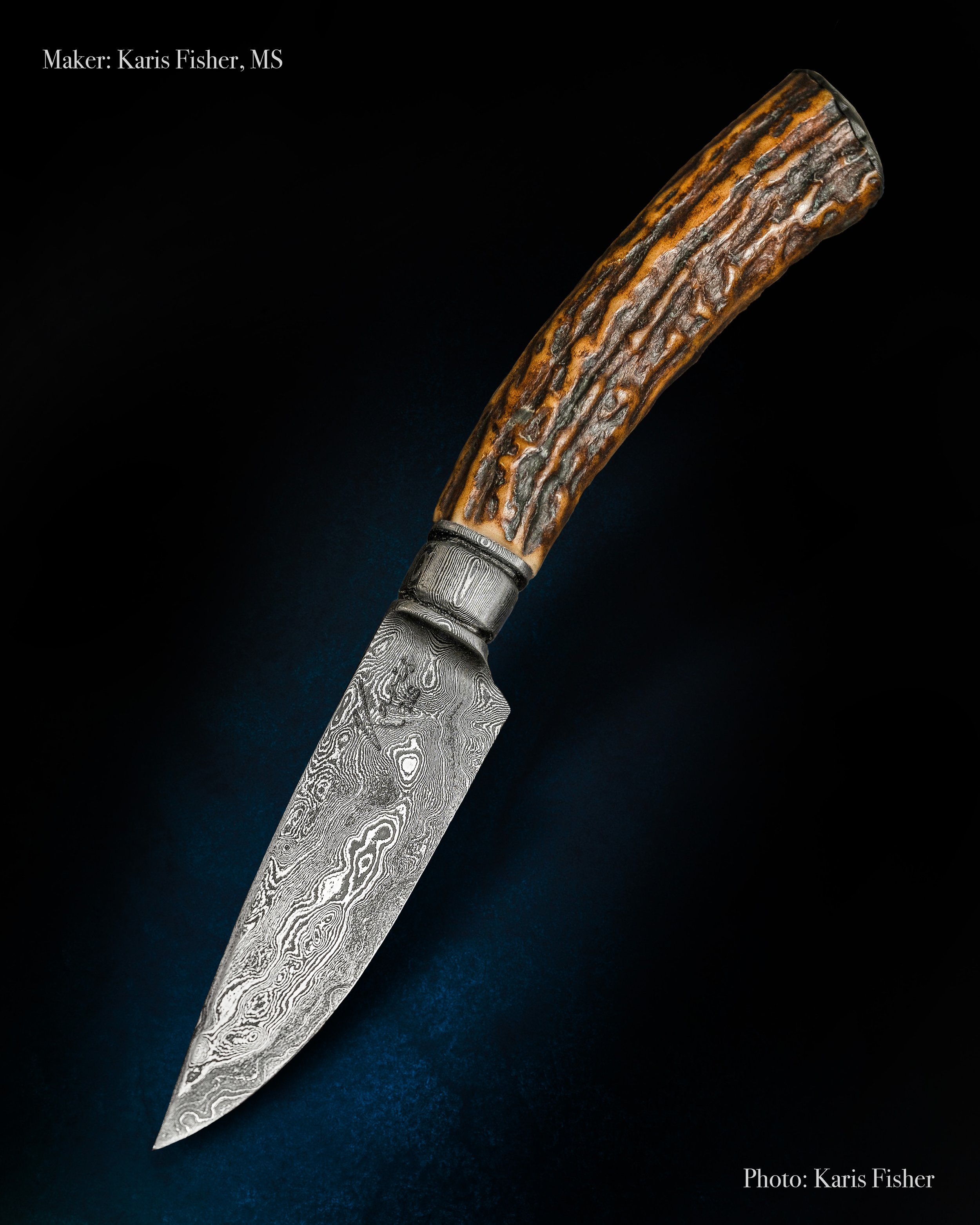 Vintage sambar stag integral with a random pattern Damascus blade made by master smith Karis Fisher, professional knife photography by Karis Fisher