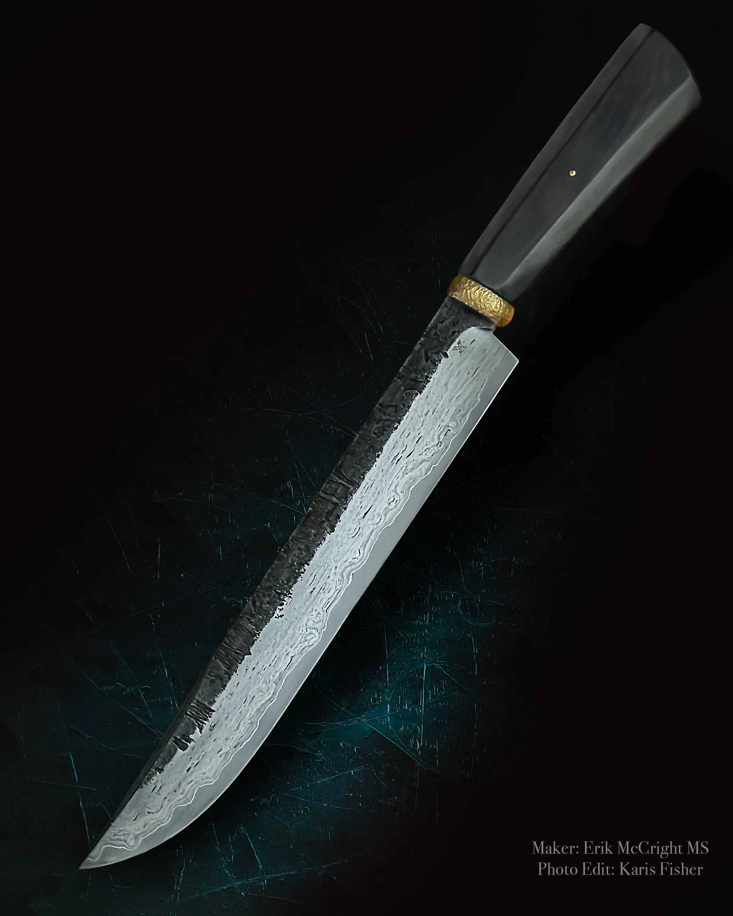 Erik McCright Handmade
African Blackwood handle
Wrought Iron San Mai
Textured Spacer