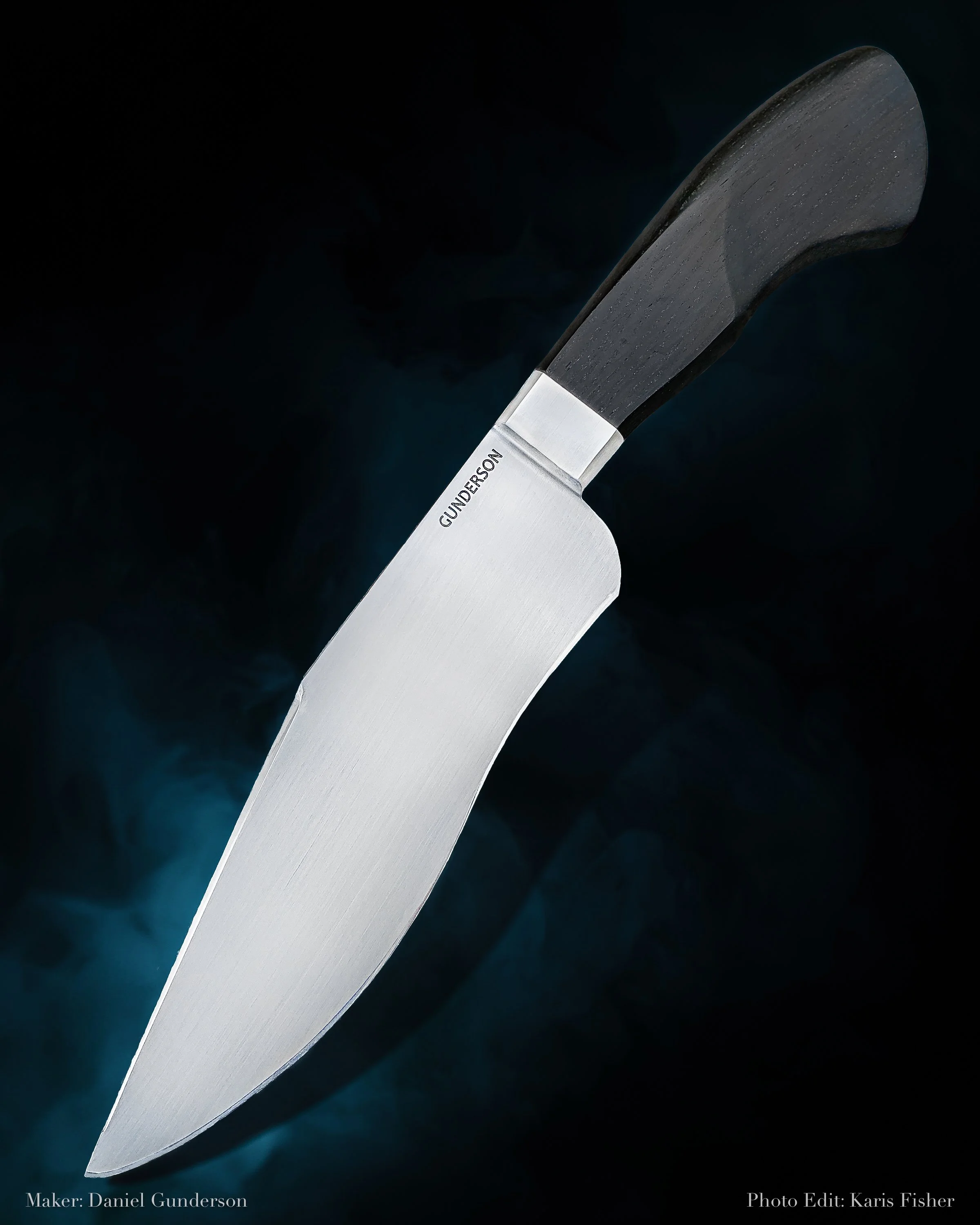 Close-up of a large kitchen knife with a wooden handle and a sharp, curved blade engraved with the name 'GUNDERSON' and the maker's name, Daniel Gunderson, in the lower left corner; dark background.