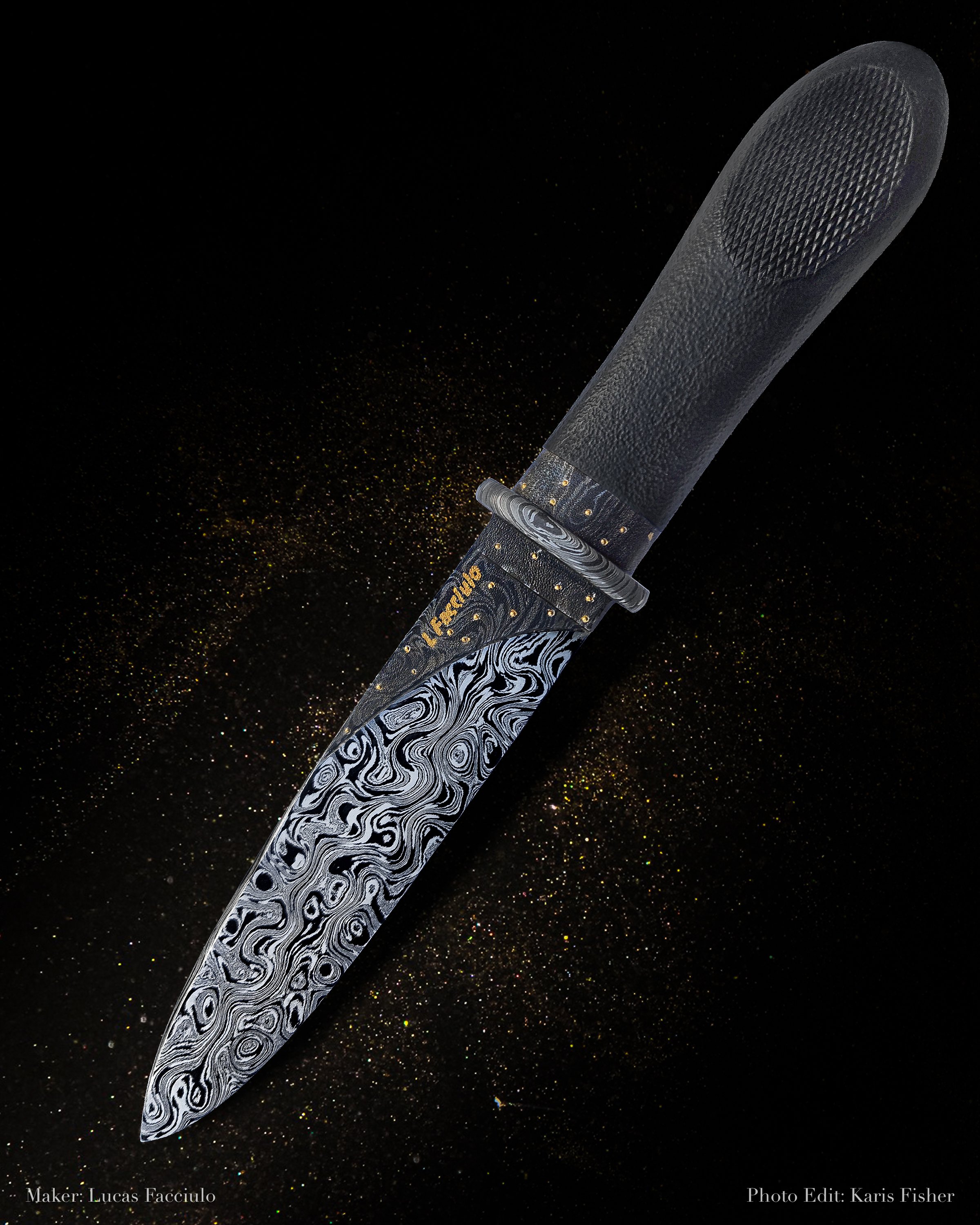 A decorative kitchen knife with a marbled black and silver blade, textured black handle, and gold accents on the bolster, set against a black background with gold specks.