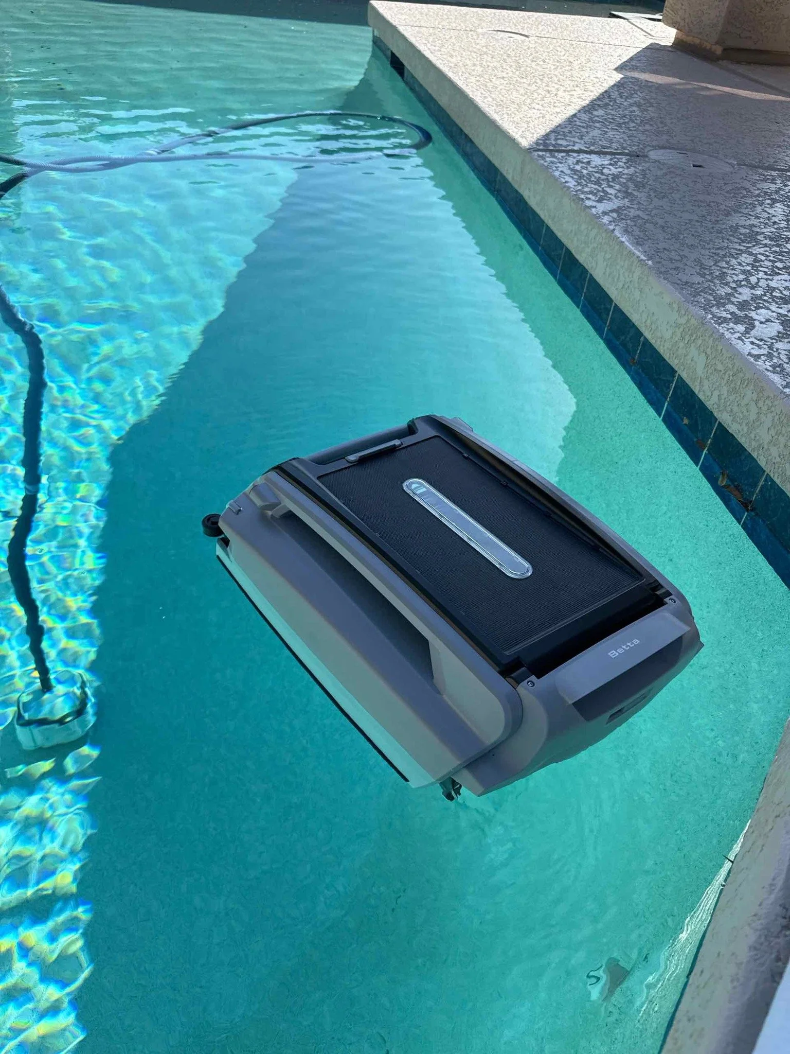 Solar Skimmer = Cleaner Surface Between Visits ☀️

This solar-powered surface skimmer helps collect leaves, pollen, and floating debris before it sinks to the bottom.

In Arizona, wind and dust can load up a pool quickly &mdash; especially between we