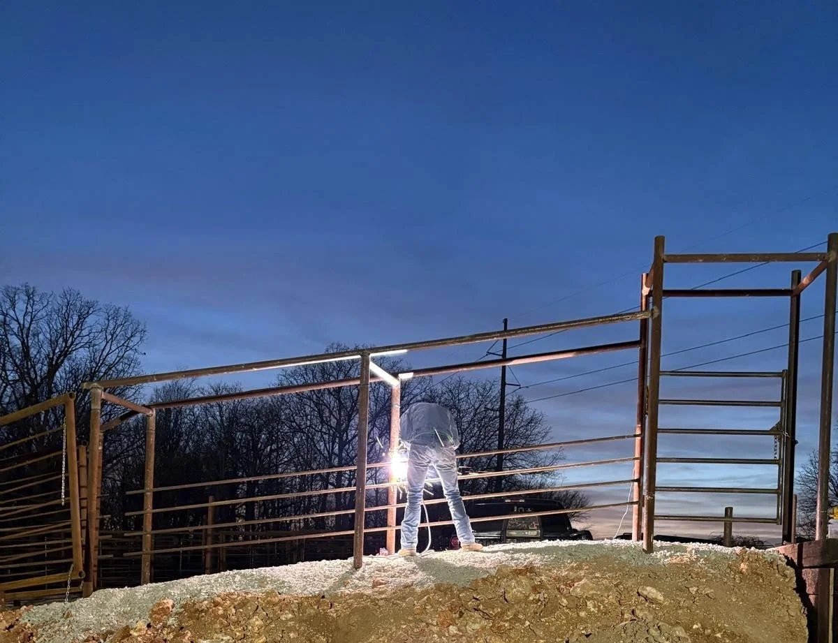 jedd welding in evening- Xtreme fab & repair.jpg