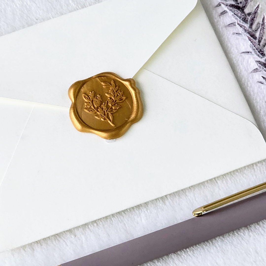 Off-White Envelope and Gold Wax Seal.png