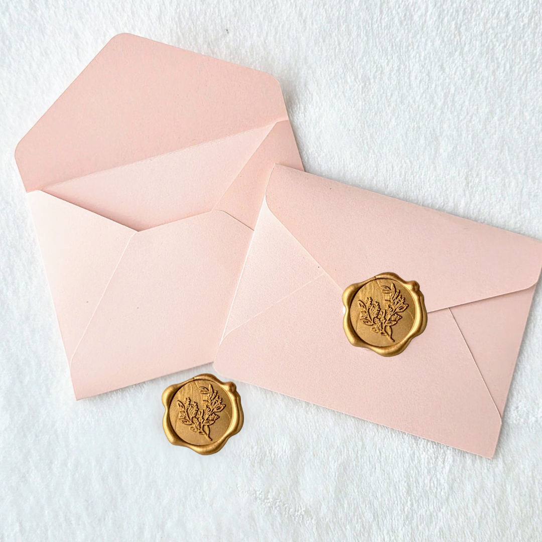 Powder Pink Small Envelopes with gold wax seals.png