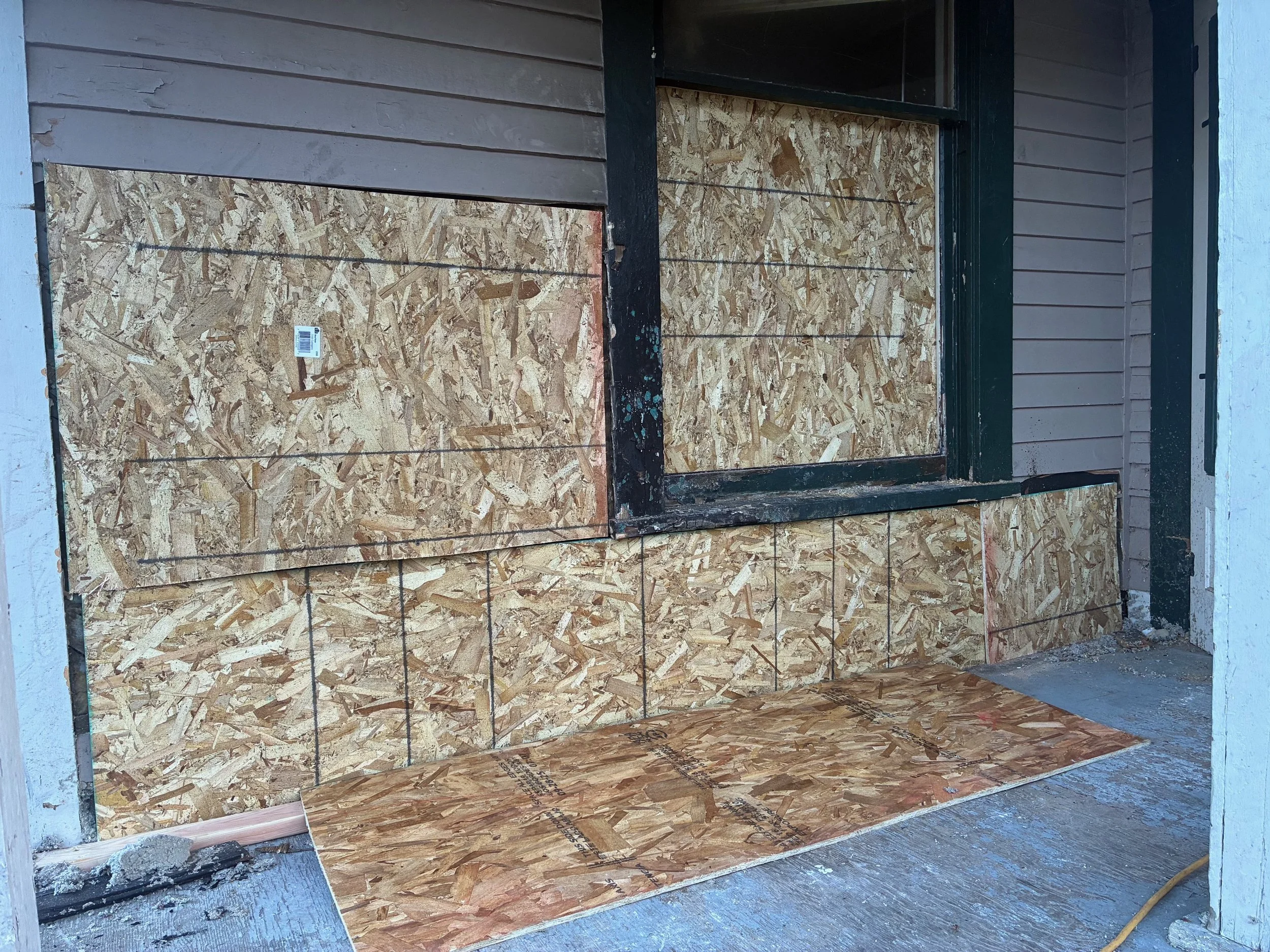 Fire damaged property board up.