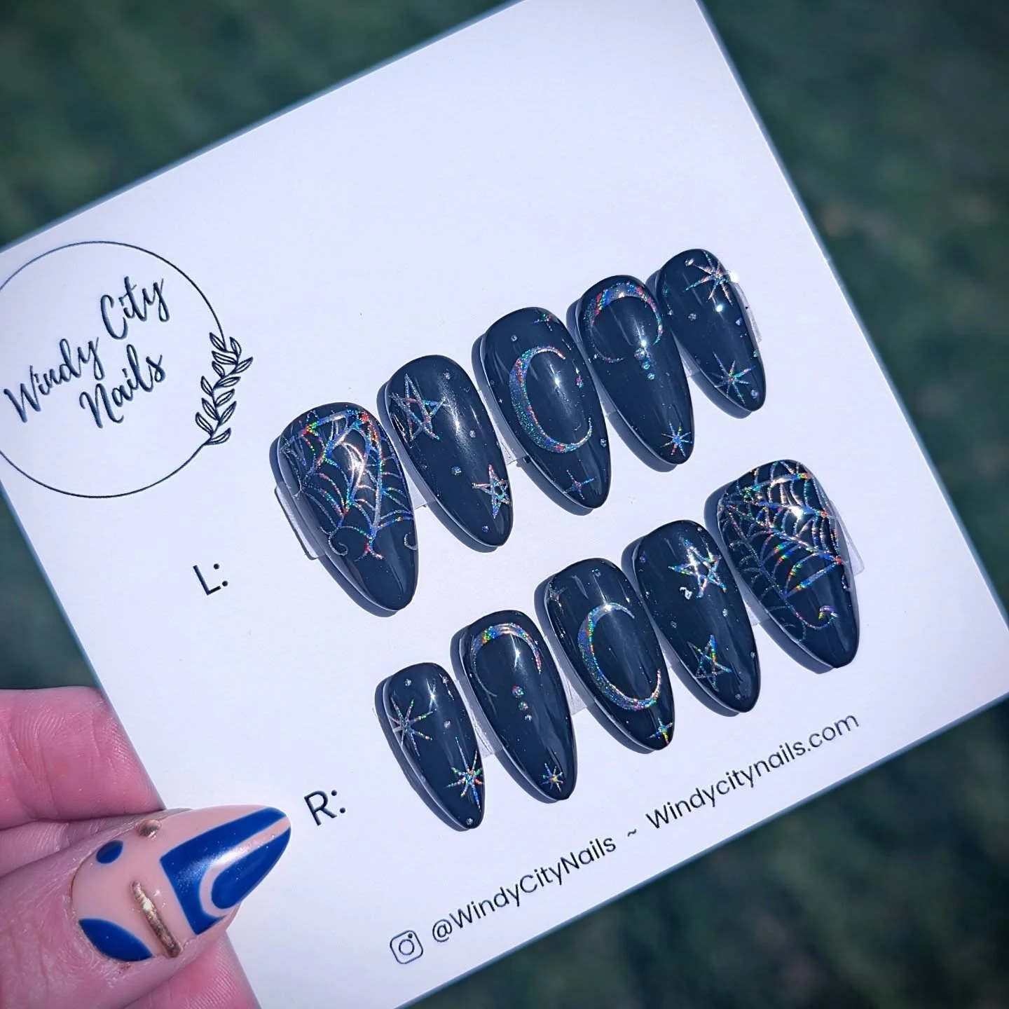 The rainbow holographic chrome powder on black is SO fun and so eye catching!  I had to snag pictures outside in the sun to get the full rainbow effect in a picture. Does this remind anyone else of those rainbow scratch off coloring books we had when