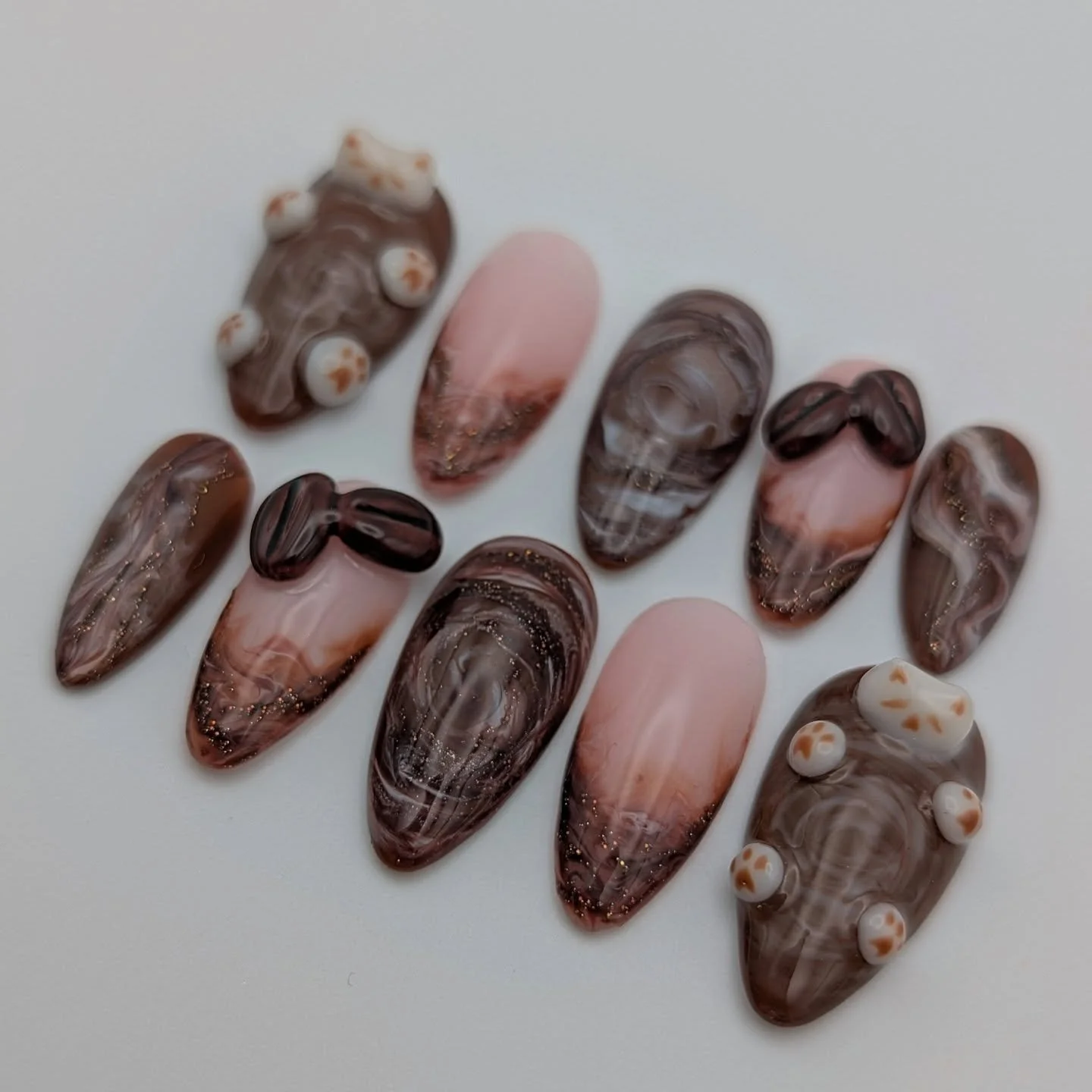 These coffee and kitty cat nails are too adorable, gotta share more of them.  From the coffee beans to the toe beans...fuhgeddaboudit 😸💅

Do you have a custom set in mind?  DM me with your inspo, let's come up with something as unique as you are. T