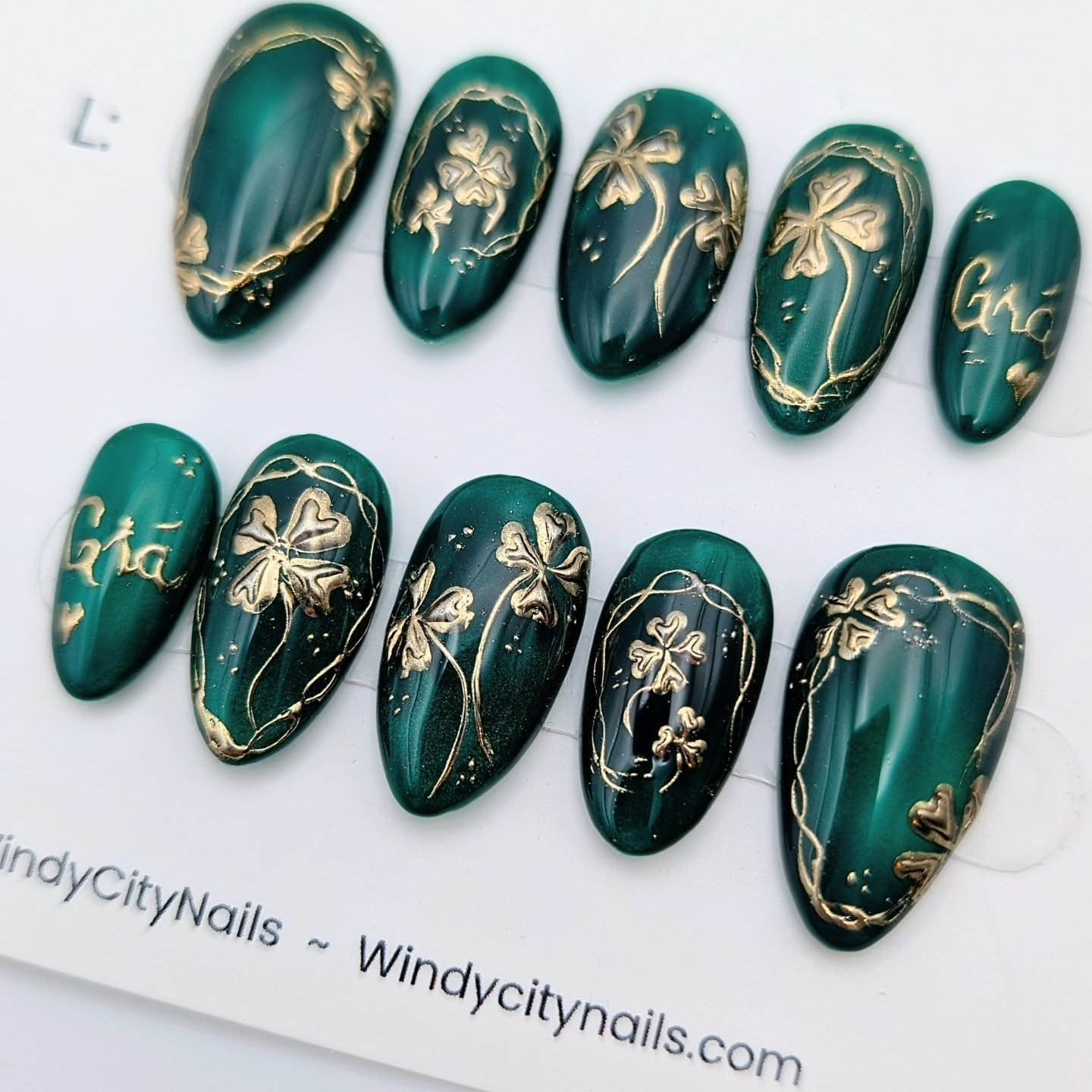 Time is flying!! Here we are at one of the more joyous holidays there is 🍀🍀

Enjoy these St. Patrick's Day nails, the base is a drool worthy 🤤 green cat eye with lots of gold chrome details 💚

Custom orders are open, link in bio, for all your nai