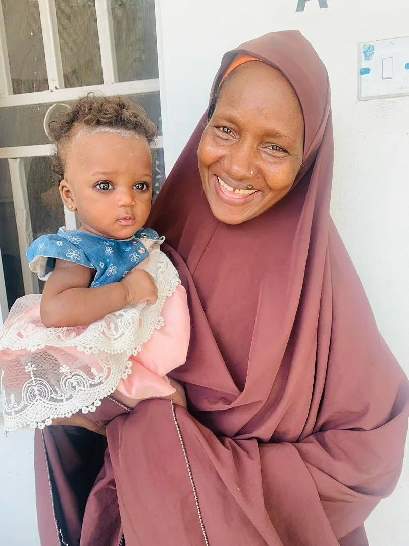 Mama Fatima has had 7 children. Her first son survived but she went on to lose every baby after him. She brought us her 7th baby, severely malnourished (4.4lbs or 2.0kg at 3 months old). Her neighbors in the village had convinced her that this 7th ba