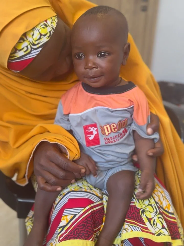 Another handsome graduate! Just 4 months difference here!

When I shared his intake video with his mama at graduation, she was shocked! She had already lost 2 babies to malnutrition before she had him, so the healing and survival of this boy was a mi