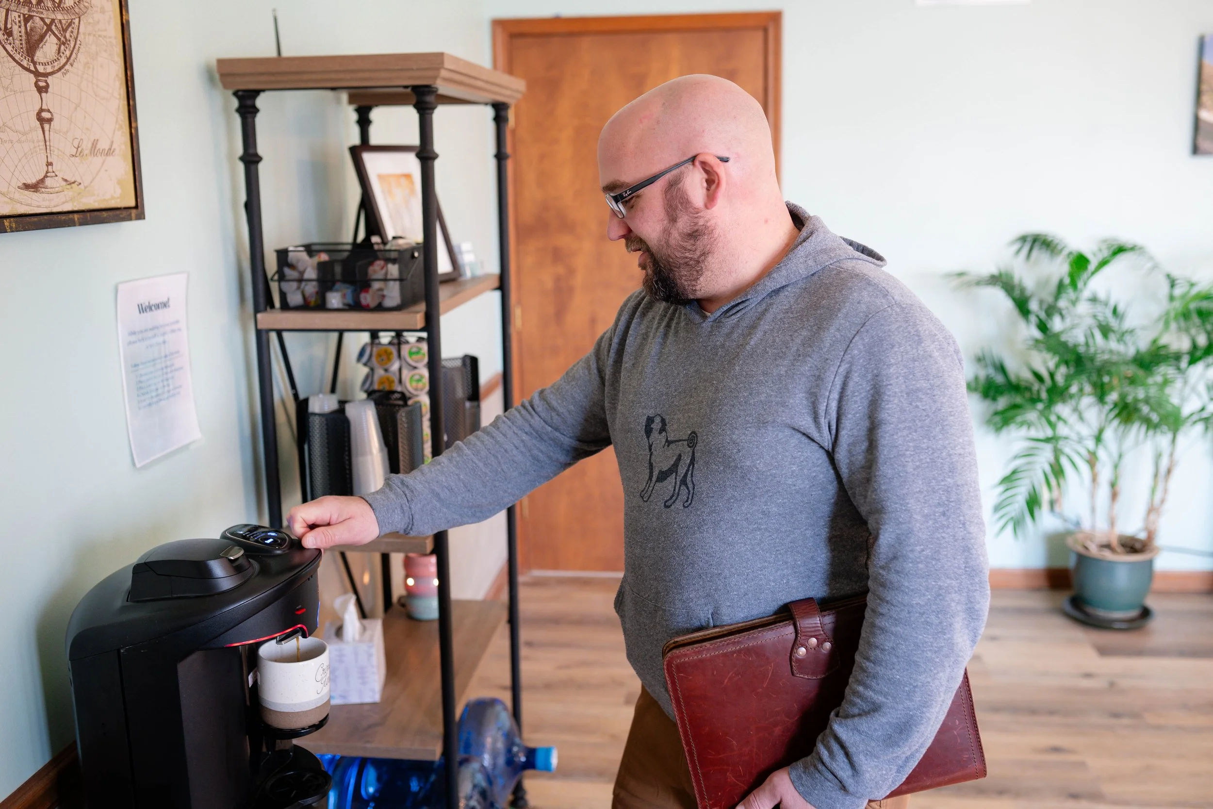 Customer coffee and refreshment station at MindSpace Collective for office members and therapy clients in Bloomington.