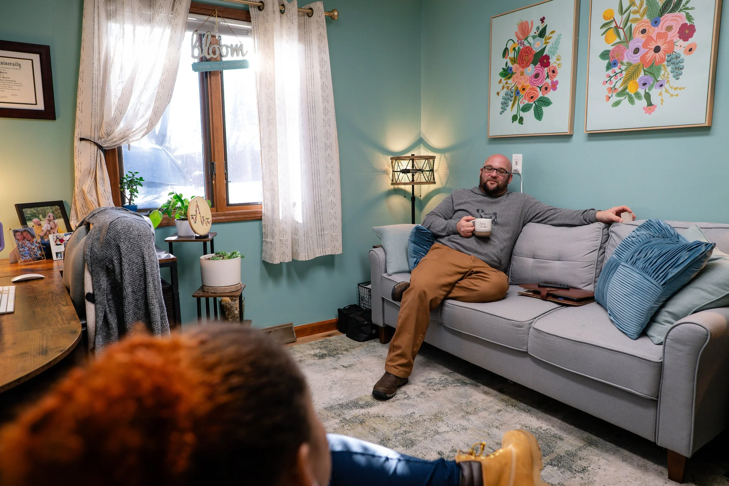 Comfortable furnished therapy office at MindSpace Collective available for counselors, psychologists, and wellness practitioners in Bloomington, Indiana.
