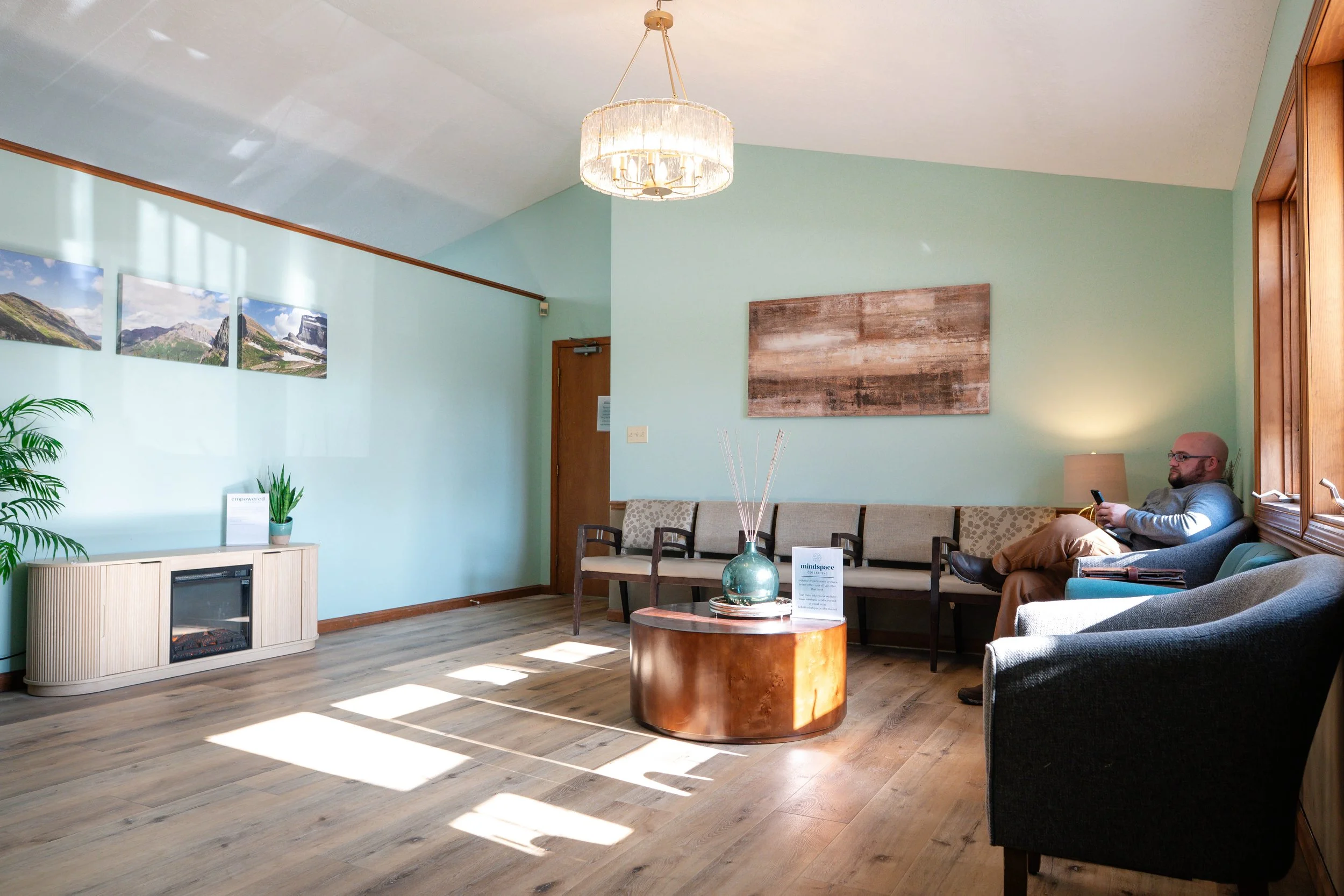Comfortable shared waiting room at MindSpace Collective for counseling offices, wellness providers, and private office members in Bloomington.