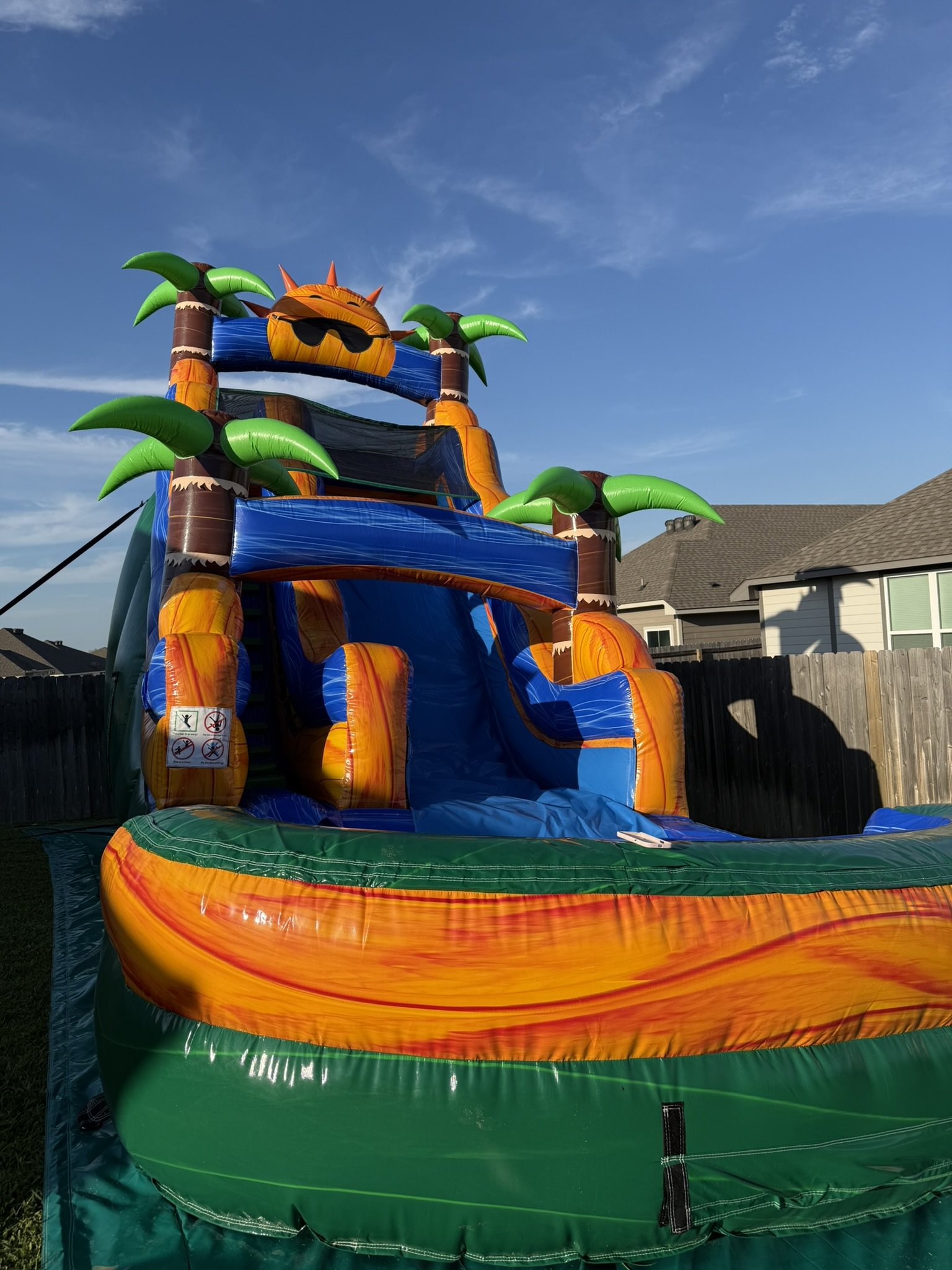 30ft long Tropical Water Slide setup in a local Brazos Valley neighborhood.